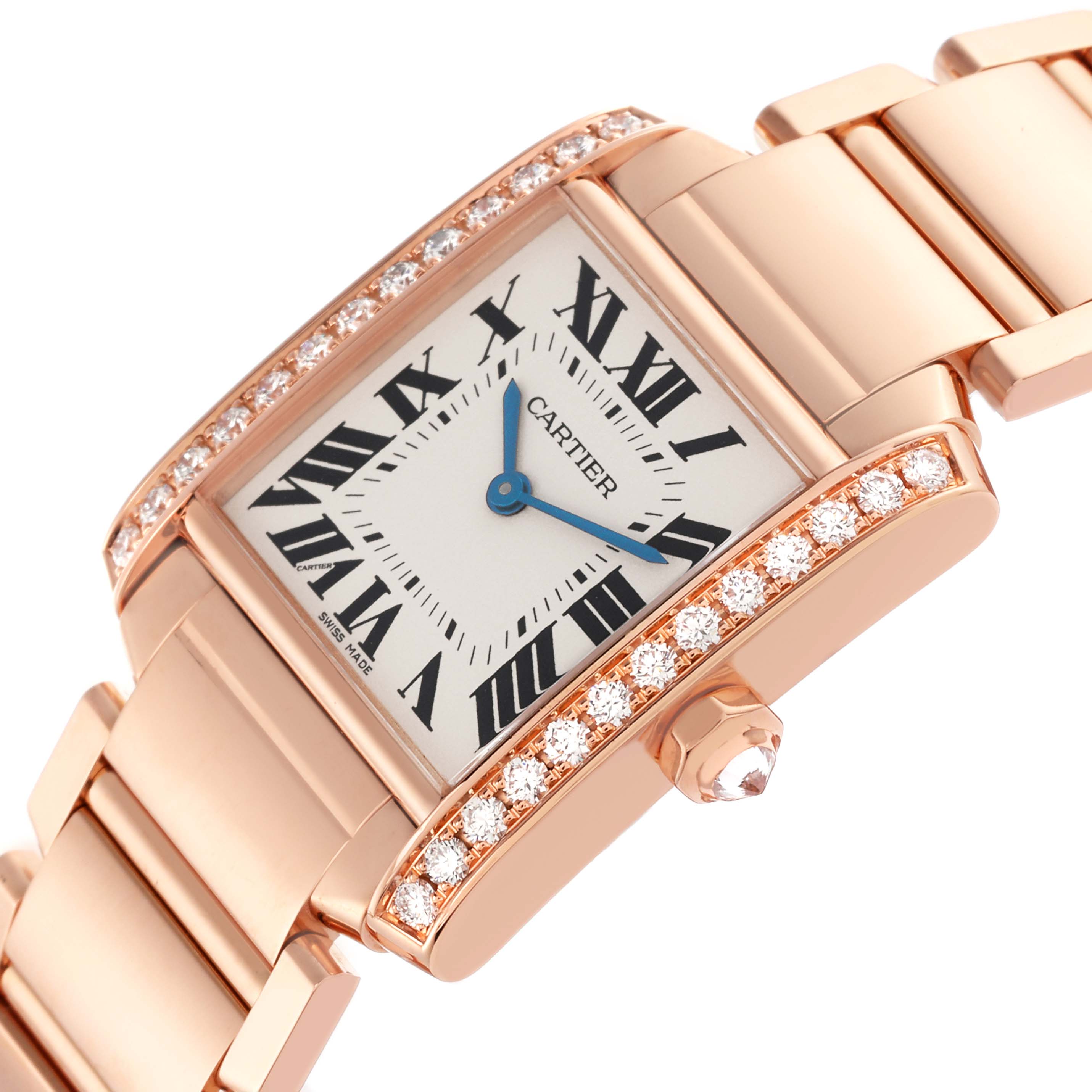 The Cartier Tank Française watch is shown at an angled view, highlighting its diamond-encrusted bezel, rectangular dial, and linked bracelet.