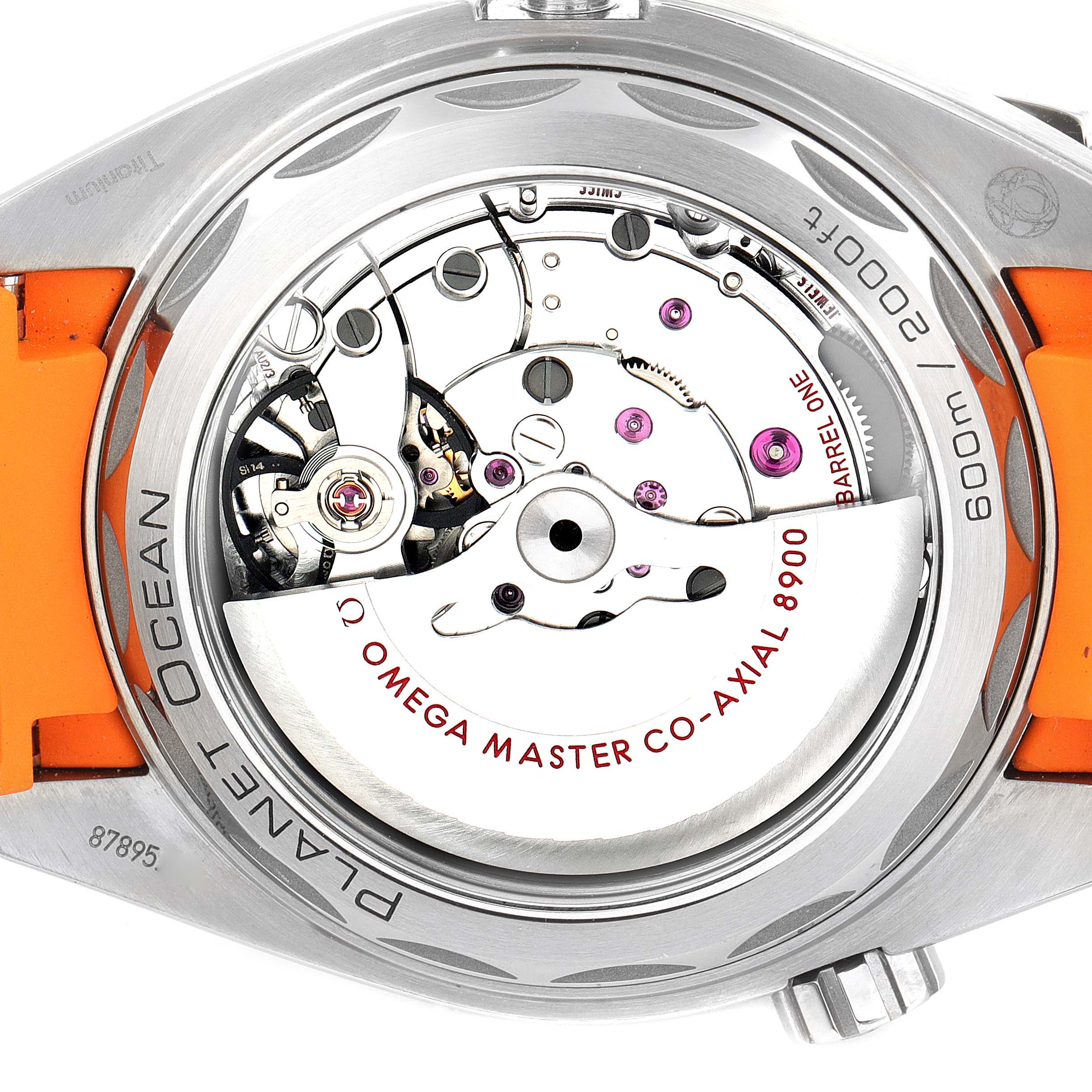 The image shows the back of an Omega Planet Ocean 215.92.44.21.99.001 Men's Titanium Grey Dial 215.92.44.21.99.001 Men's Titanium Grey Dial watch, highlighting its internal movement and components.