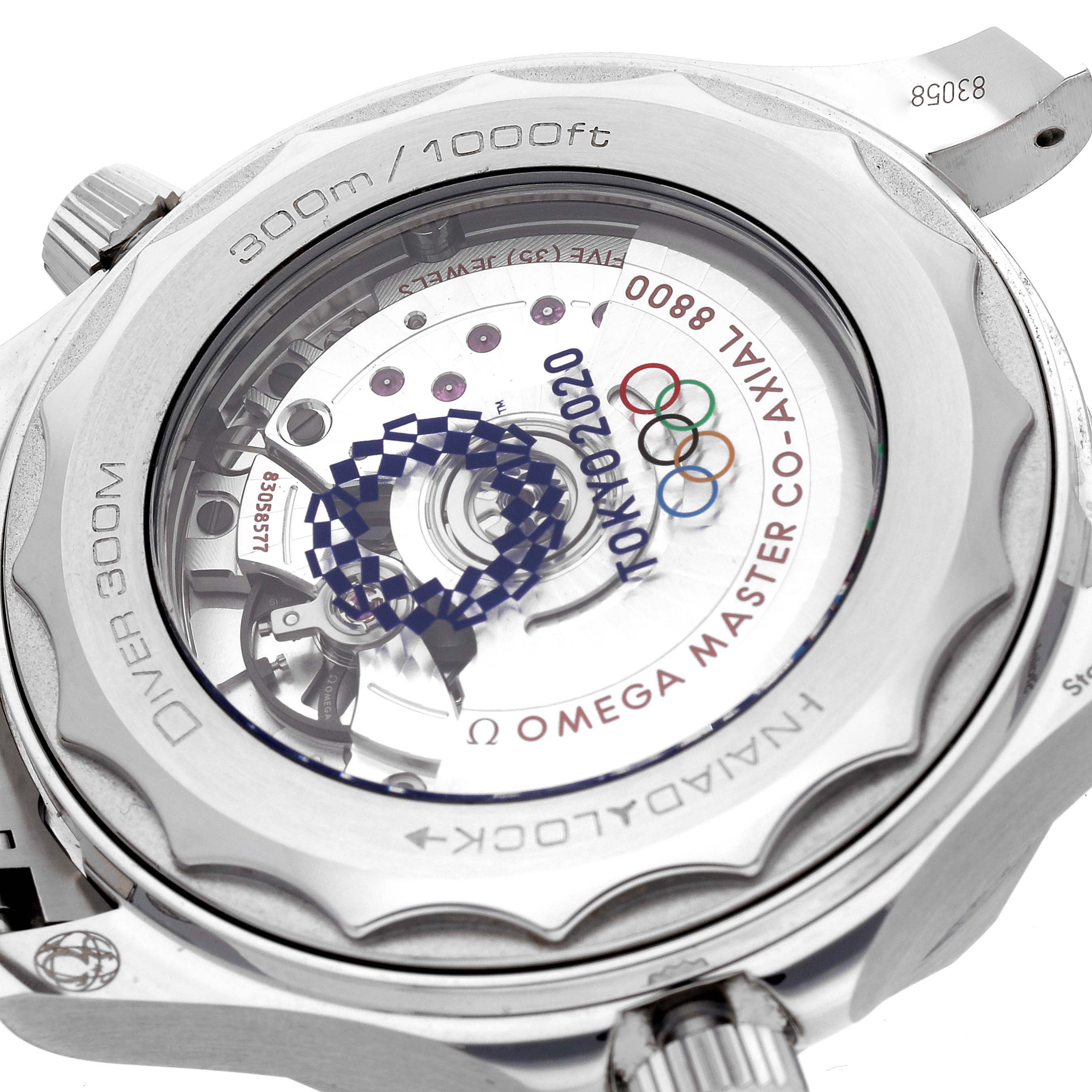 The image shows the back case of an Omega Seamaster 522.30.42.20.04.001 Men's Stainless Steel White Dial 522.30.42.20.04.001 Men's Stainless Steel White Dial watch, highlighting the movement and water resistance markings.