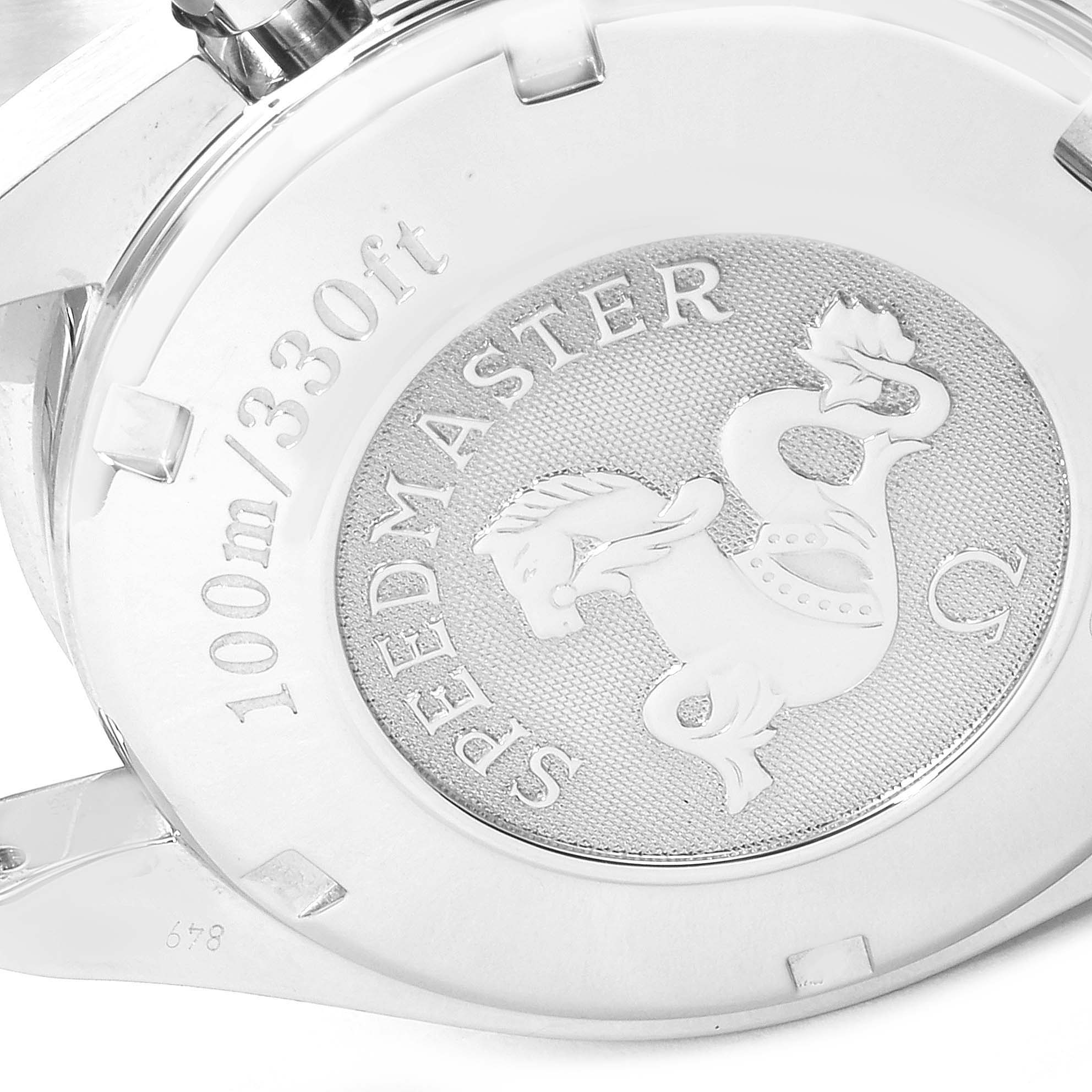 The image shows the back case of the Omega Speedmaster 3210.50.00 Men
s Stainless Steel Black Dial 3210.50.00 Men
s Stainless Steel Black Dial watch, highlighting the water resistance rating and engraved emblem.