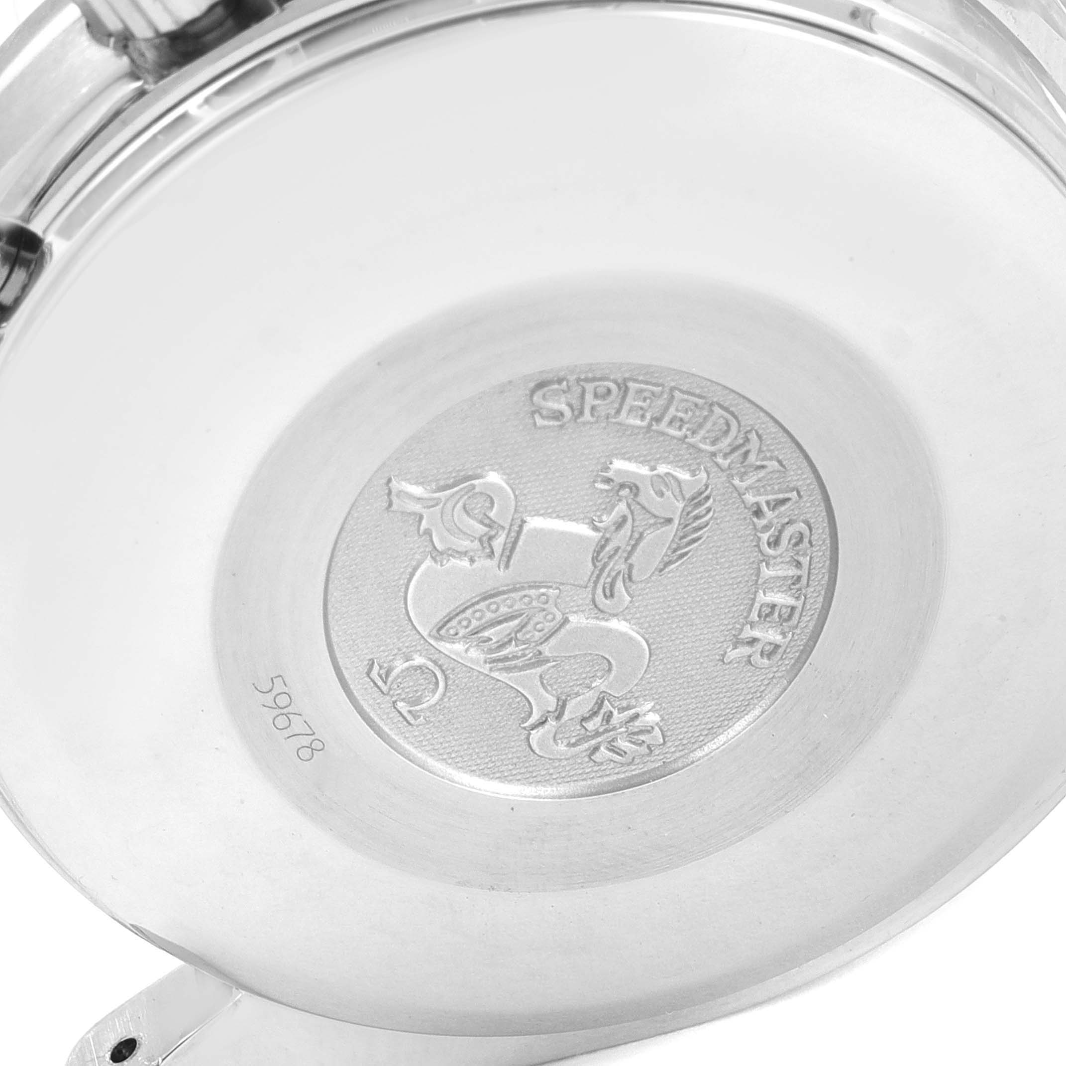 This image shows the back case of an Omega Speedmaster 3513.50.00 Men's Stainless Steel Black Dial 3513.50.00 Men's Stainless Steel Black Dial watch, highlighting its engraved emblem and model name.