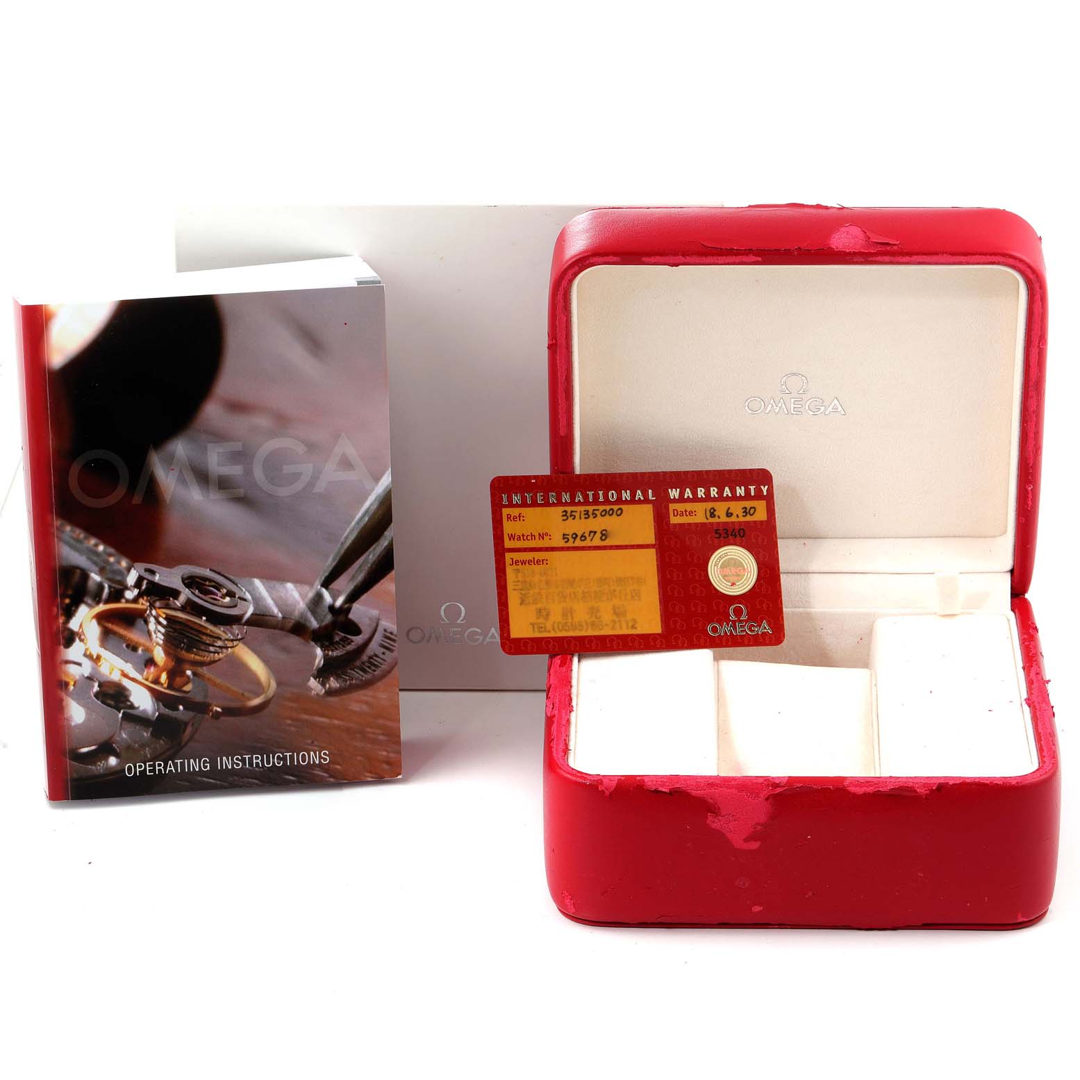 The image shows the Omega Speedmaster 3513.50.00 Men's Stainless Steel Black Dial 3513.50.00 Men's Stainless Steel Black Dial's red watch case, warranty card, and operating instructions, from a frontal angle.