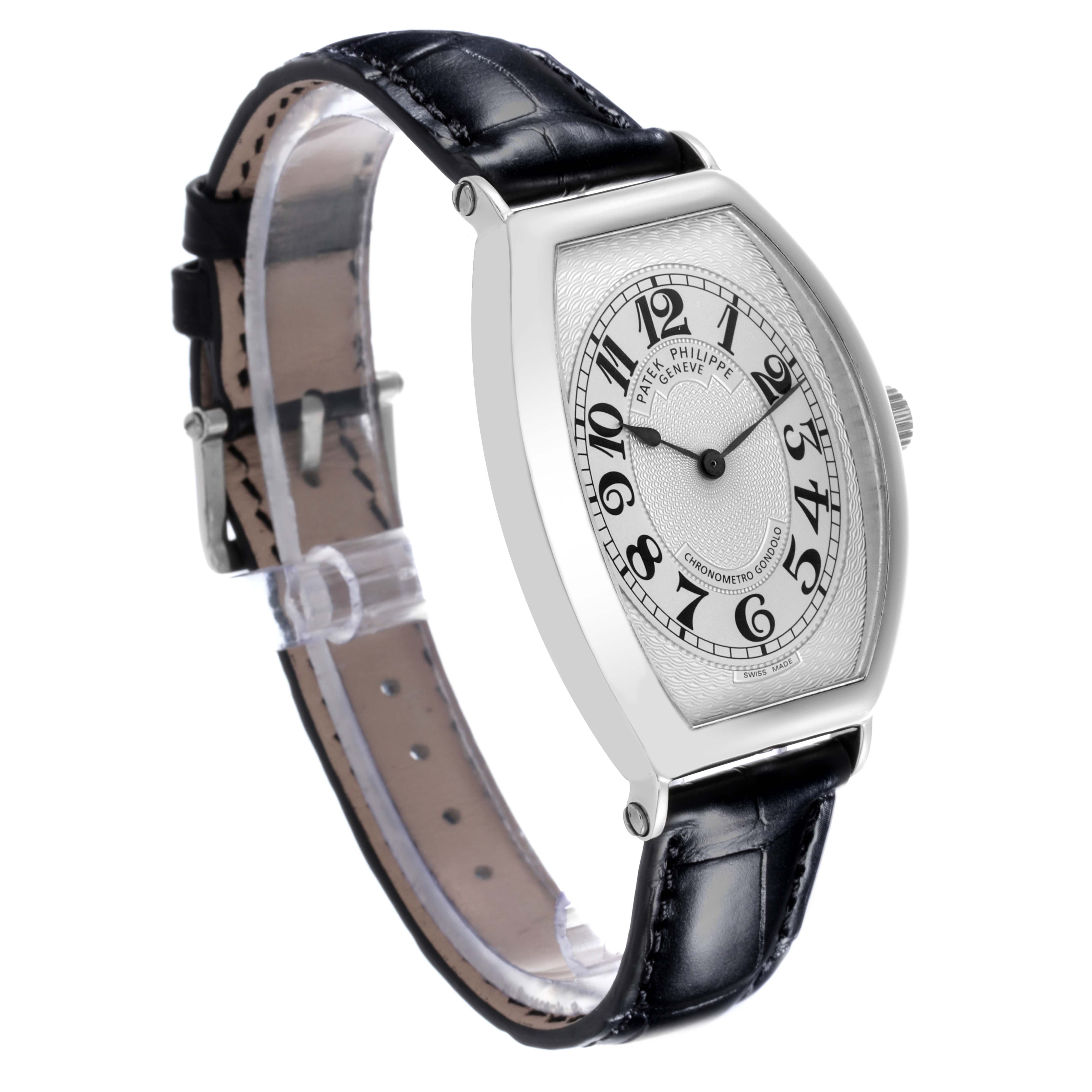The Patek Philippe Gondolo 5098P-001 Men's Platinum Silver Dial 5098P-001 Men's Platinum Silver Dial watch is shown at an angled side view highlighting the dial, case, and leather strap.