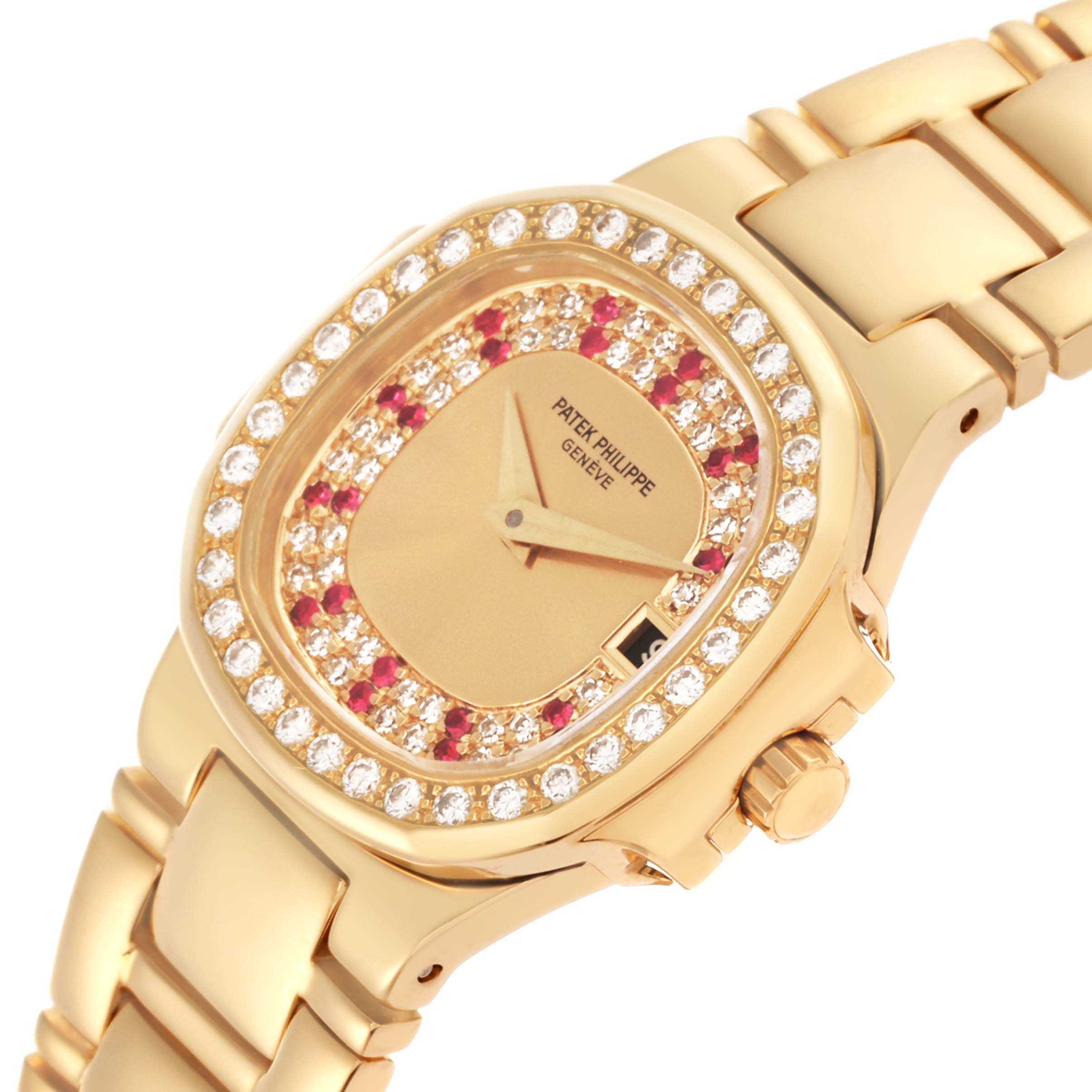 The Patek Philippe Nautilus 4700/153 Women's Yellow Gold Champagne Dial 4700/153 Women's Yellow Gold Champagne Dial watch is shown at an angle highlighting the diamond-encrusted bezel, dial, and part of the bracelet.