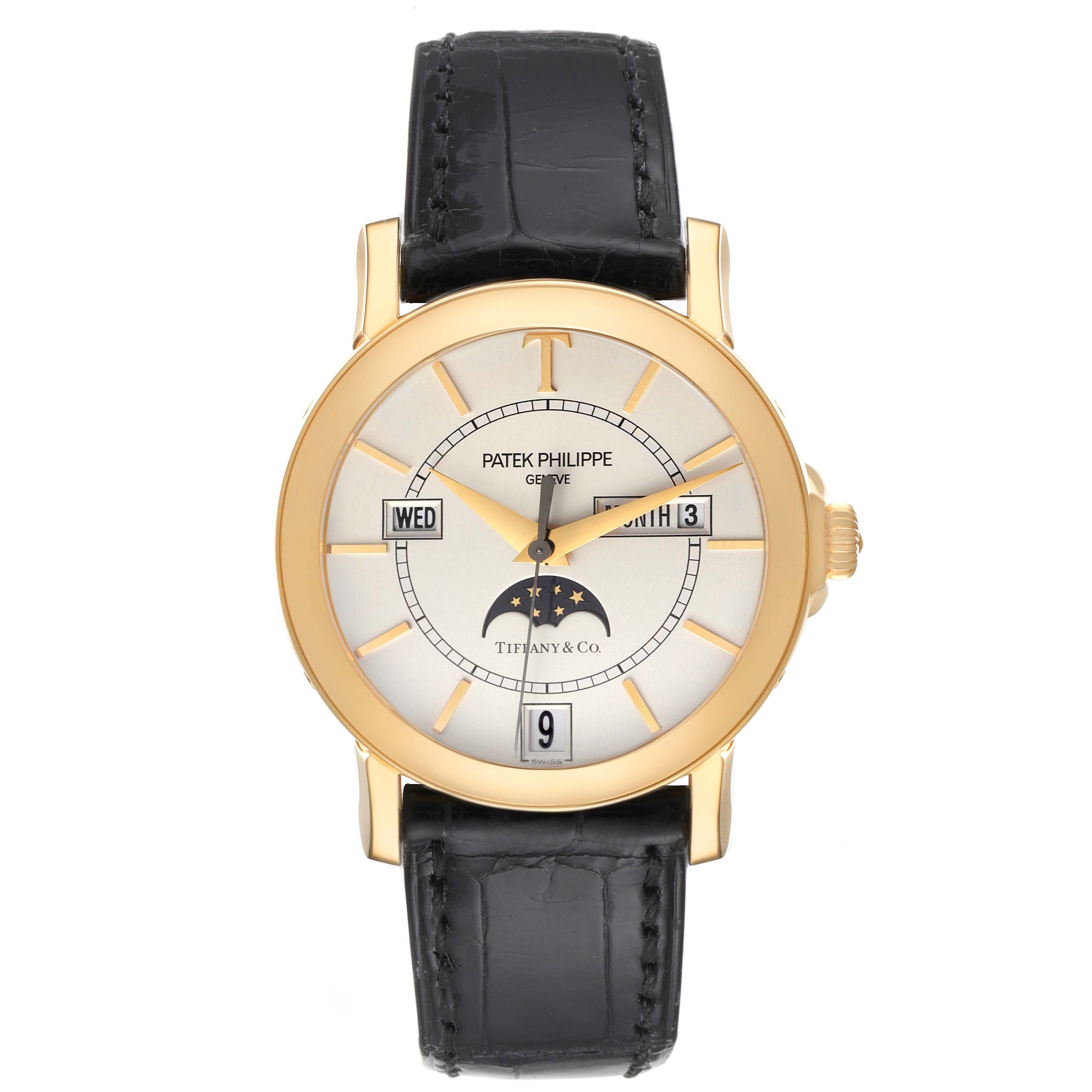 The image shows a front view of the Patek Philippe Complications 5150J Men's Yellow Gold Silver Dial 5150J Men's Yellow Gold Silver Dial watch, displaying the dial, date, day, and moon phase features.
