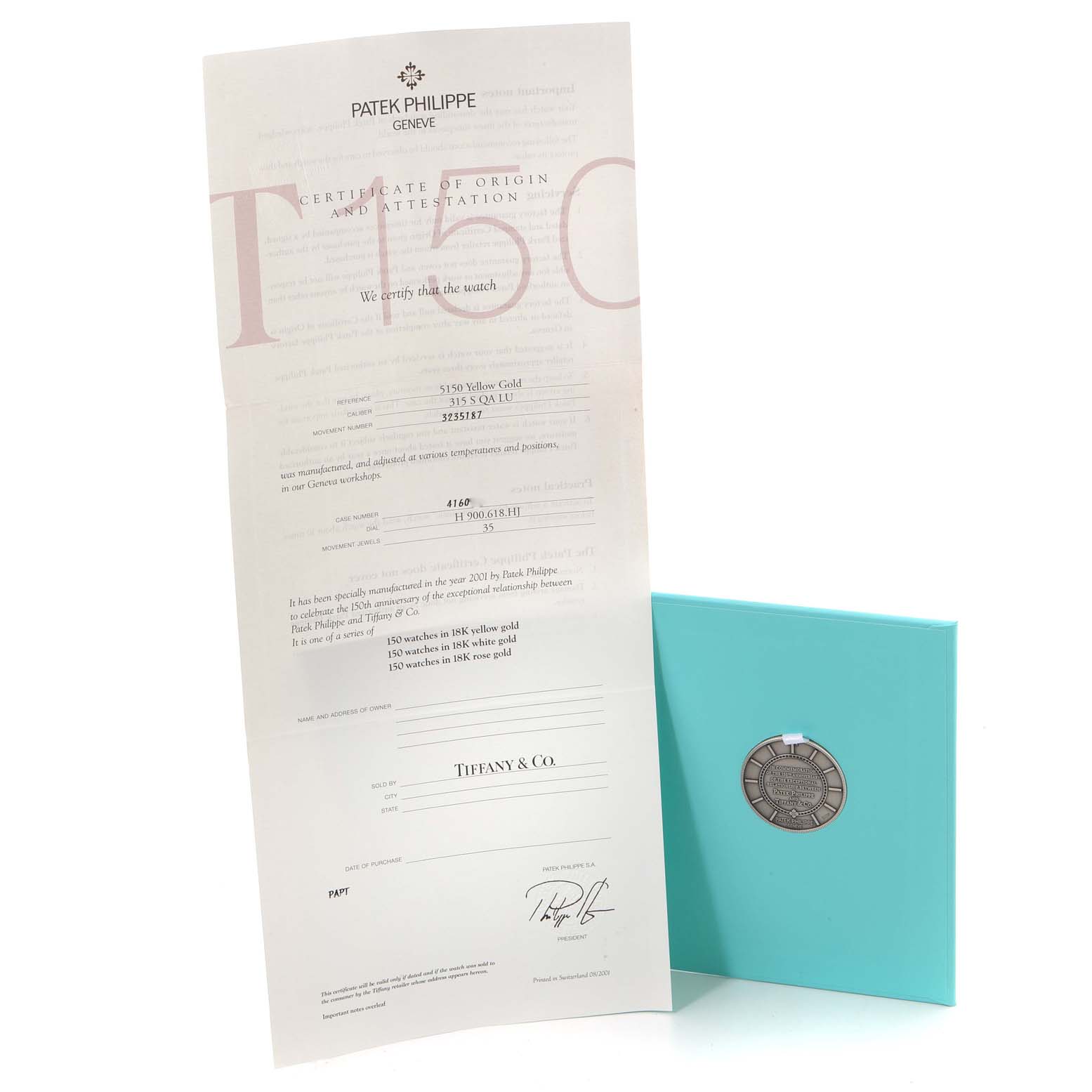 The image shows a Patek Philippe Complications model 5150J certificate and a turquoise envelope with a medallion, photographed from the front.
