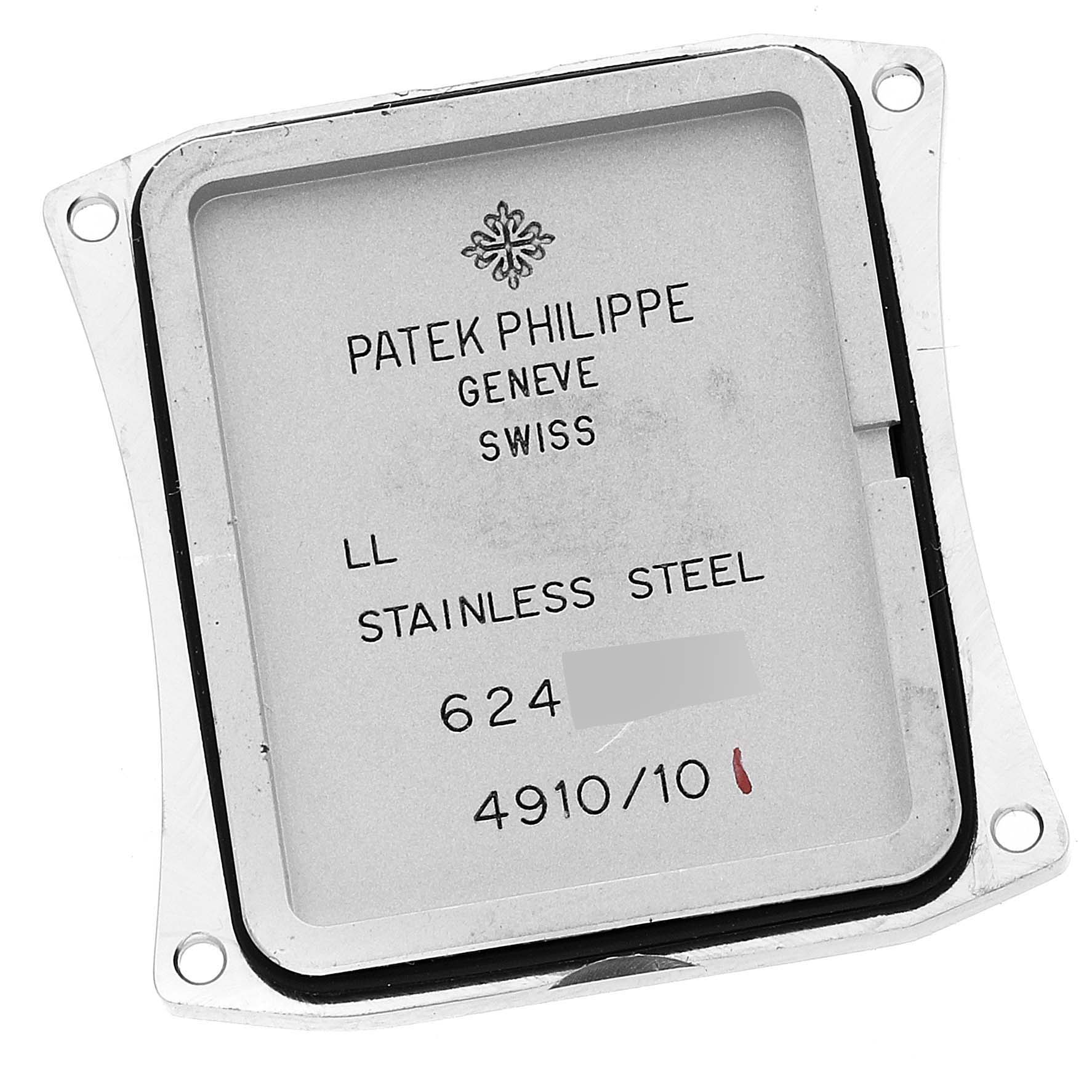 This image shows the back case of a Twenty-4 model by Patek Philippe, focusing on its inscriptions and material.