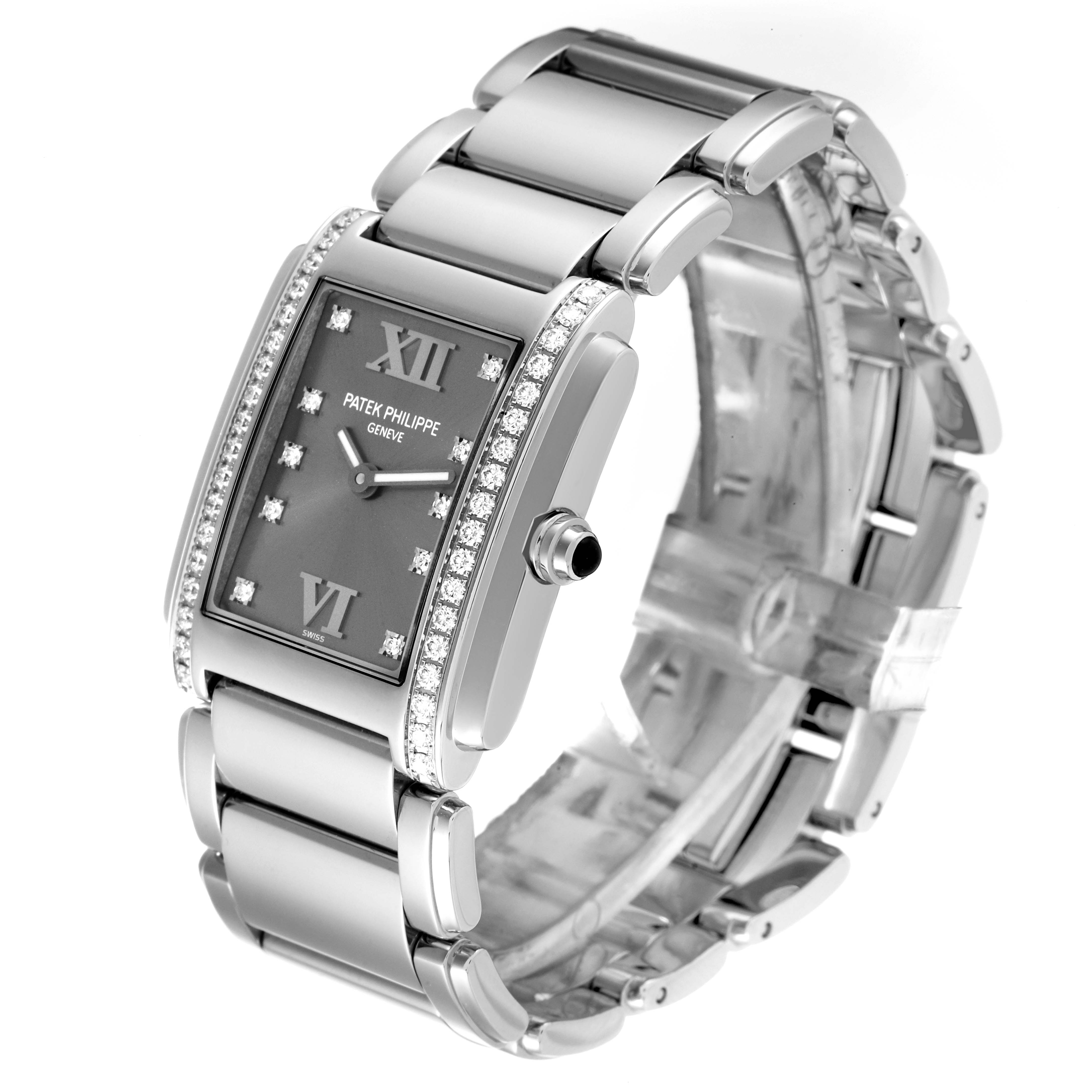 This image shows a Patek Philippe Twenty-4 4910 Women's Stainless Steel Grey Dial 4910 Women's Stainless Steel Grey Dial watch, showcasing its face, bezel, and bracelet at a slight angled view.