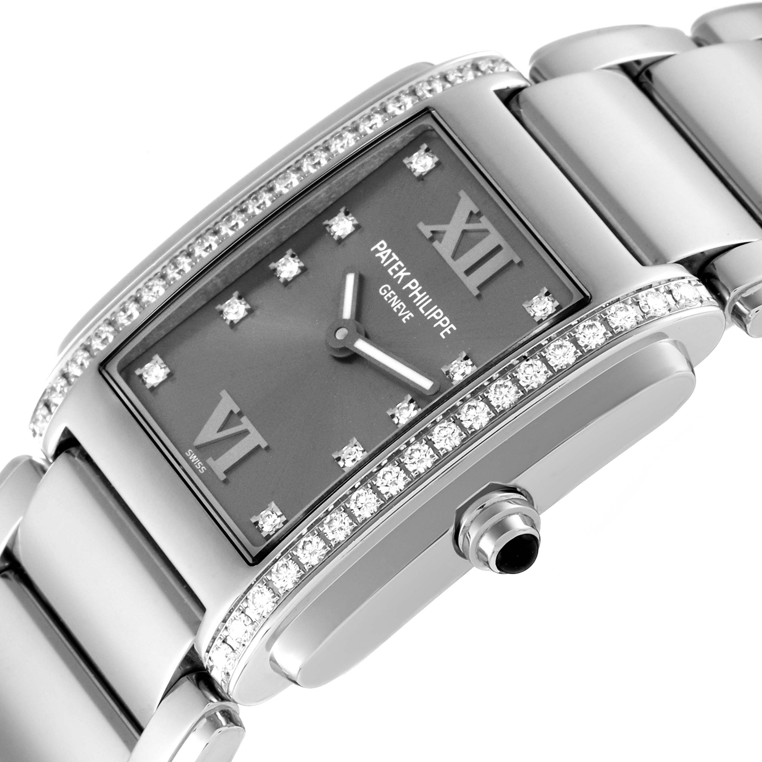 The image shows a close-up angle of the Patek Philippe Twenty-4 4910 Women's Stainless Steel Grey Dial 4910 Women's Stainless Steel Grey Dial watch, highlighting the dial, bezel, and bracelet.