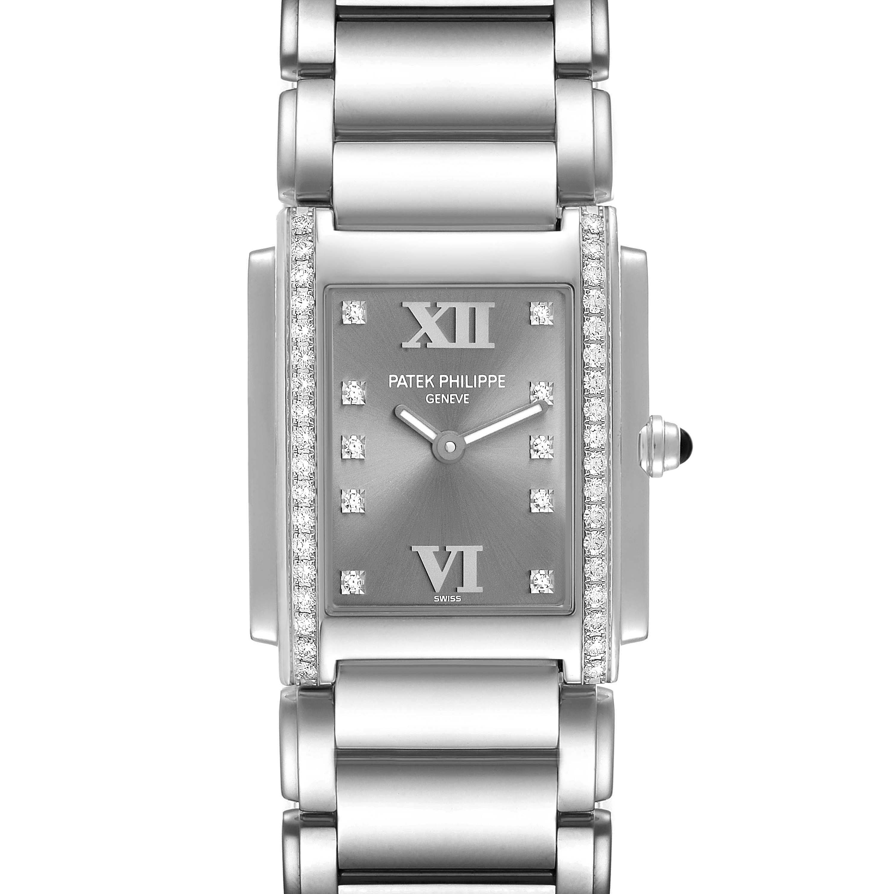 This image shows a frontal view of a Patek Philippe Twenty-4 4910 Women's Stainless Steel Grey Dial 4910 Women's Stainless Steel Grey Dial watch, highlighting the dial, bezel, and bracelet.