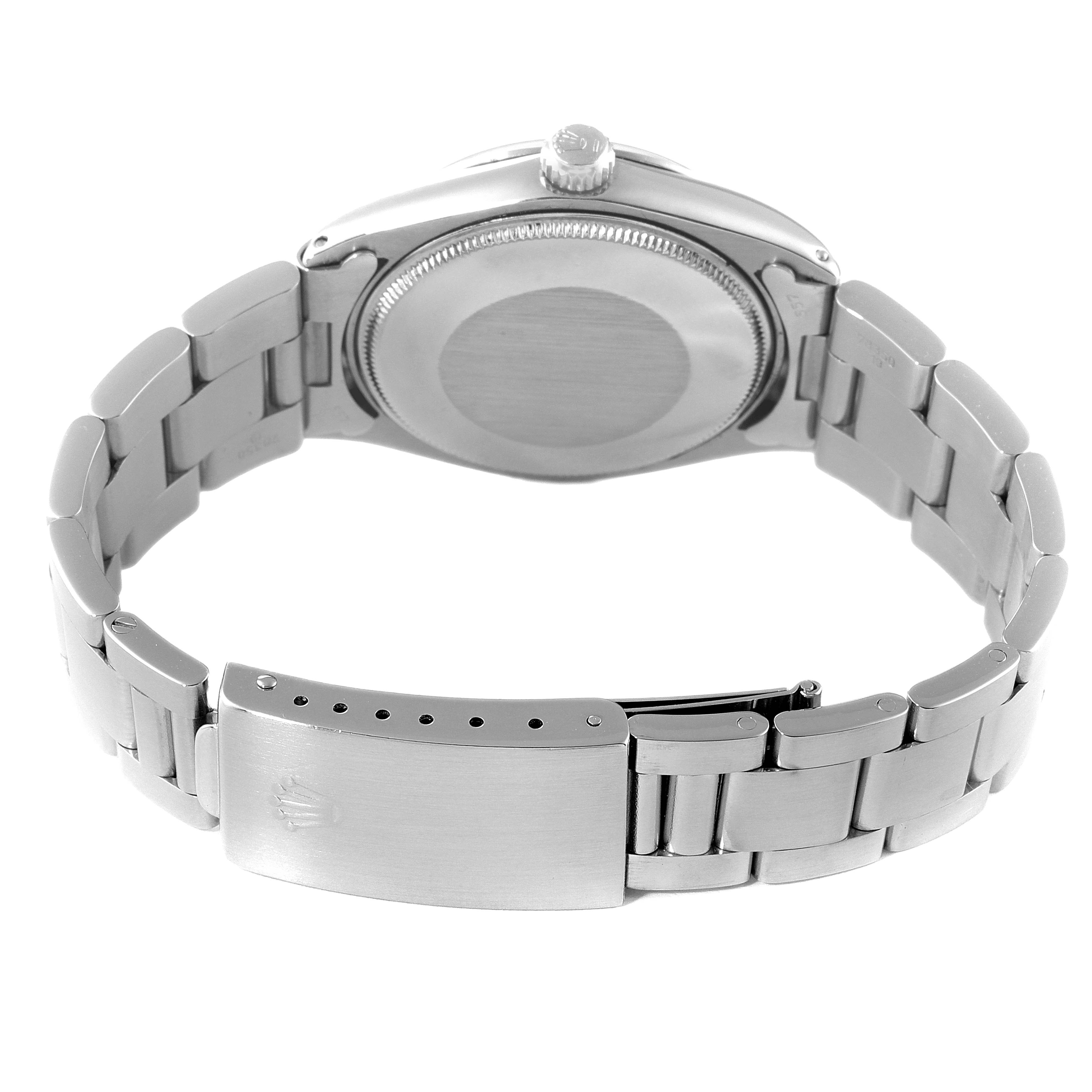 This image shows the back view of a Rolex Vintage Collection 5500 Men
s Stainless Steel Silver Dial 5500 Men
s Stainless Steel Silver Dial watch, highlighting its metal bracelet and clasp with the Rolex logo.