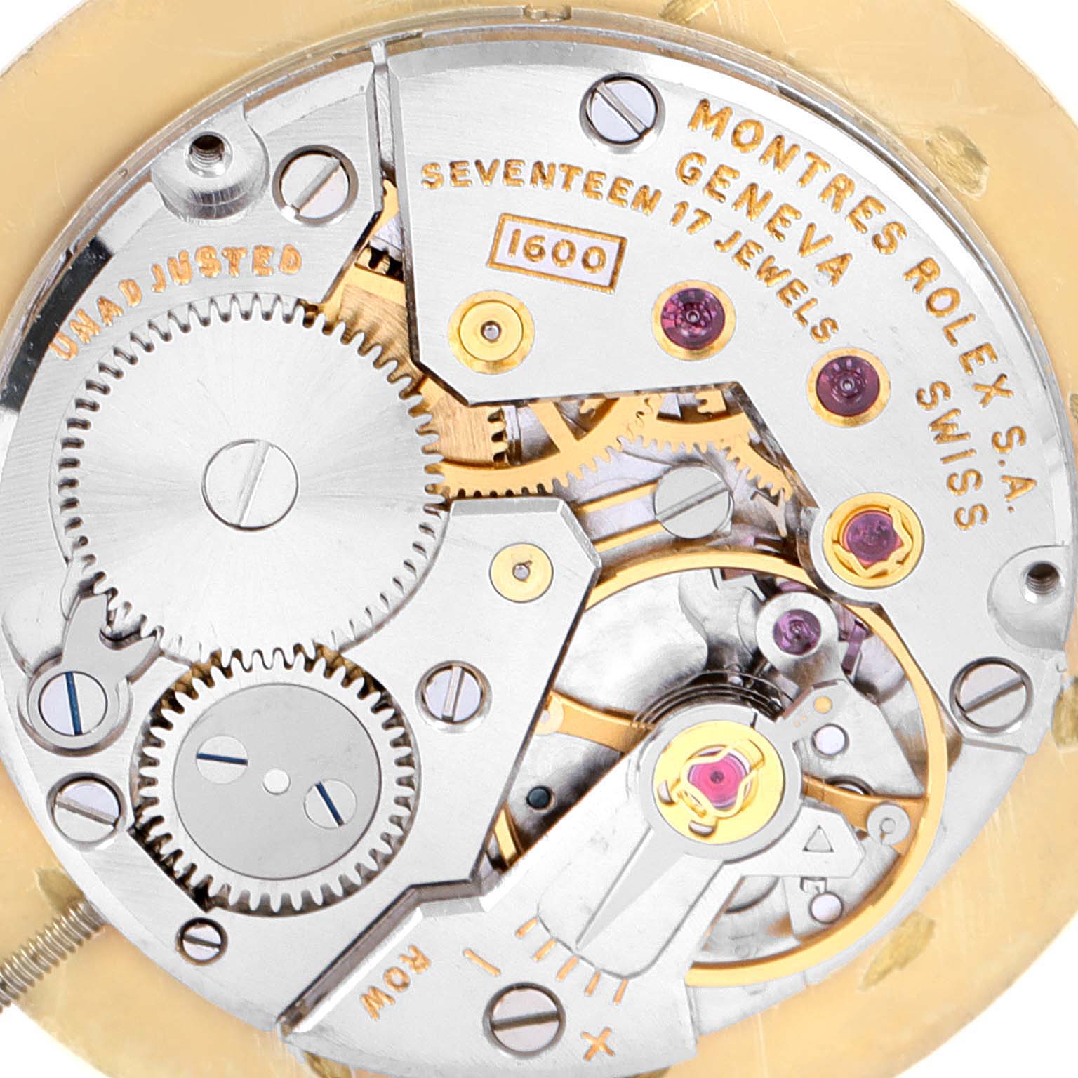 This image shows a close-up of the internal mechanics and movement of a Rolex Cellini Men's Yellow Gold Champagne Dial Men's Yellow Gold Champagne Dial watch.