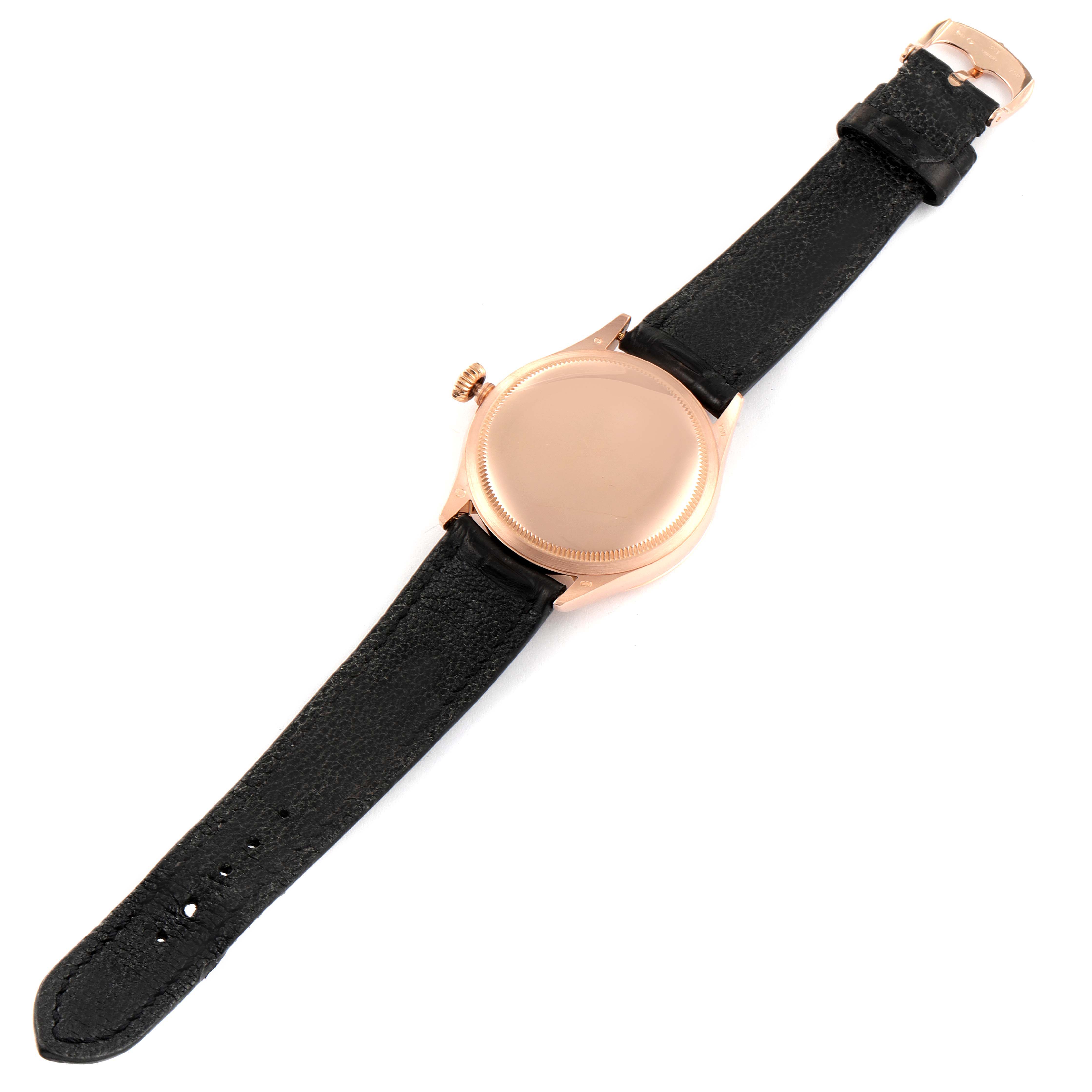 The Rolex Cellini 50505 Men's Rose Gold Black Dial 50505 Men's Rose Gold Black Dial watch is shown from the back, displaying the case, crown, and black leather strap.