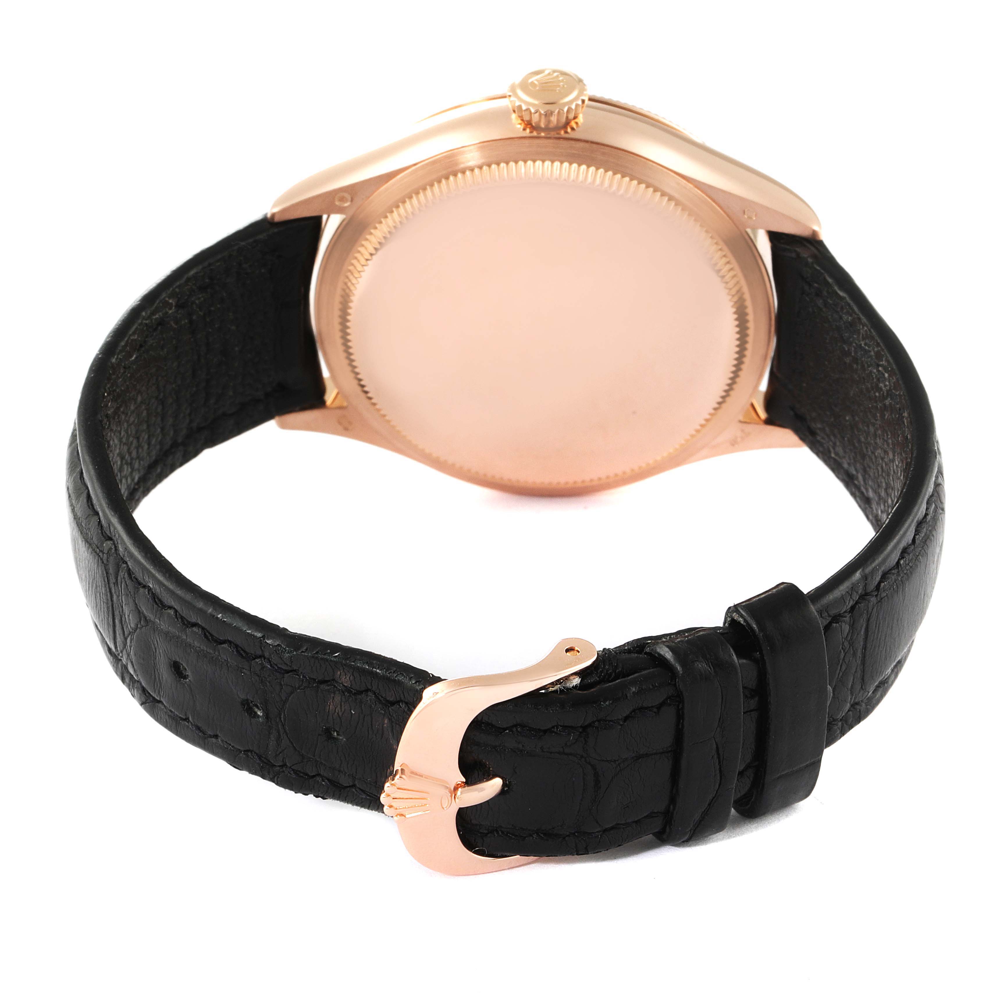 The image shows the back of a Rolex Cellini 50505 Men's Rose Gold Black Dial 50505 Men's Rose Gold Black Dial watch, featuring the caseback, crown, and black leather strap with a gold clasp.