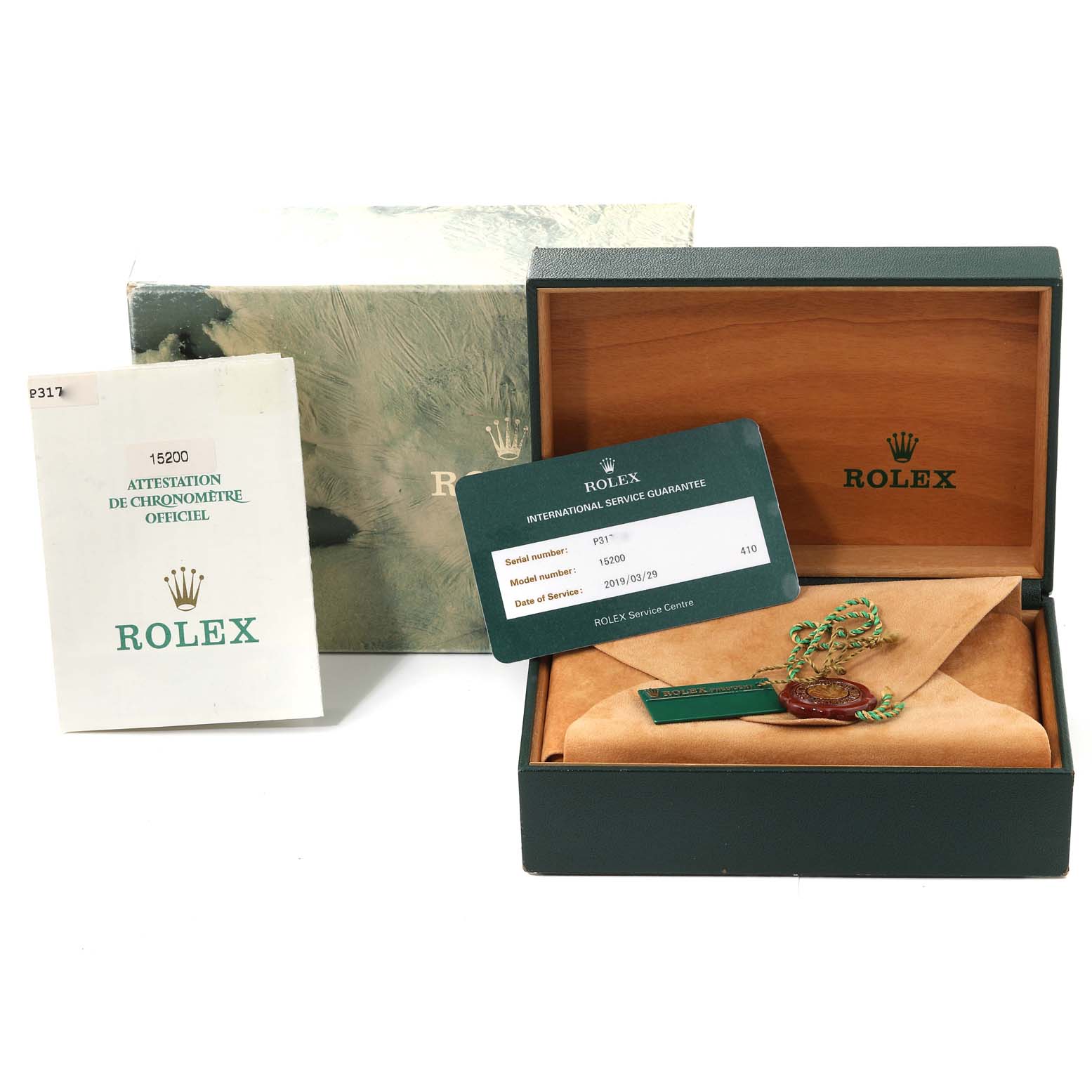 This image displays the box, warranty card, and certificate for a Rolex Date 15200 Men
s Stainless Steel Black Dial 15200 Men
s Stainless Steel Black Dial watch model.