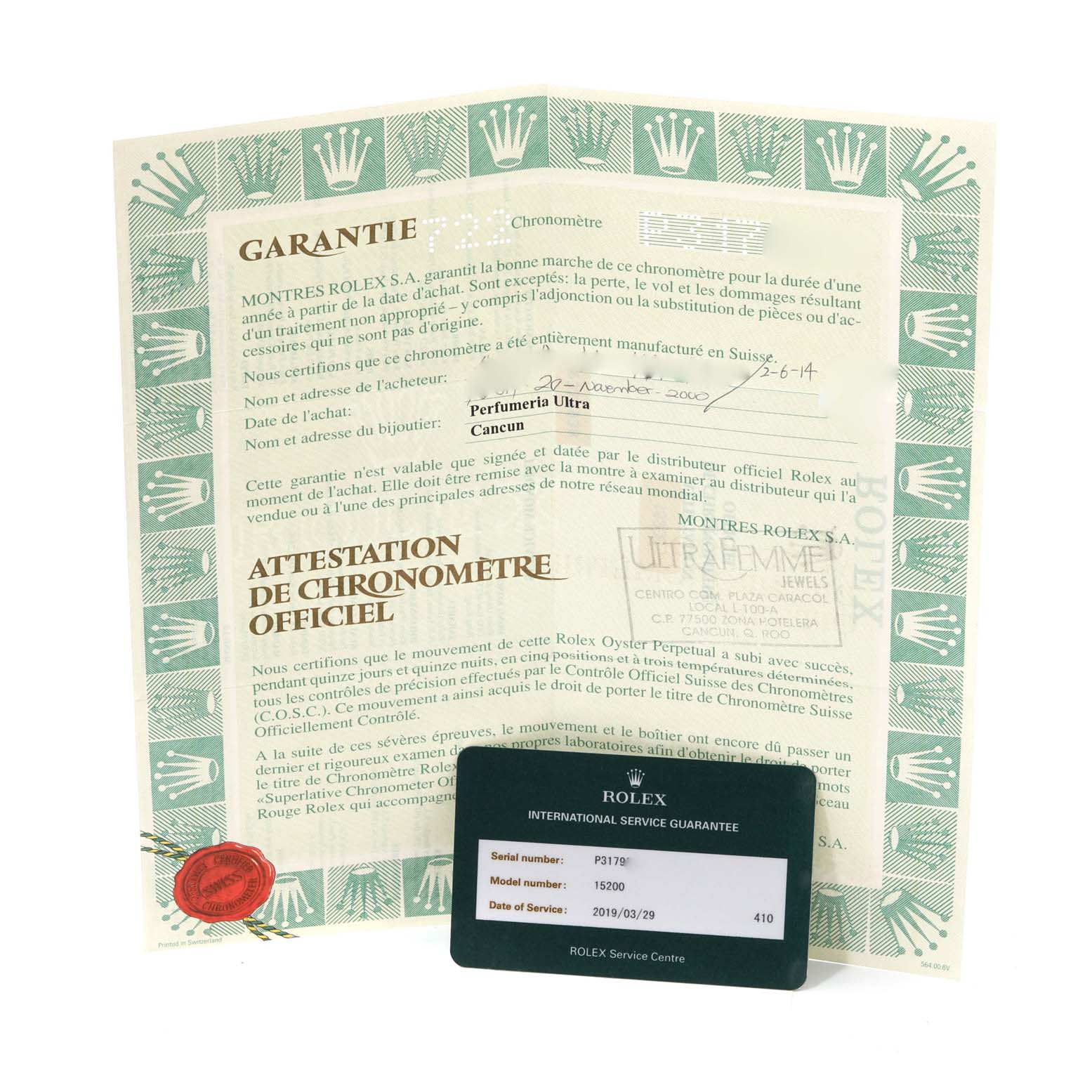 The image shows a Rolex Date 15200 Men
s Stainless Steel Black Dial 15200 Men
s Stainless Steel Black Dial model warranty certificate and an international service guarantee card.