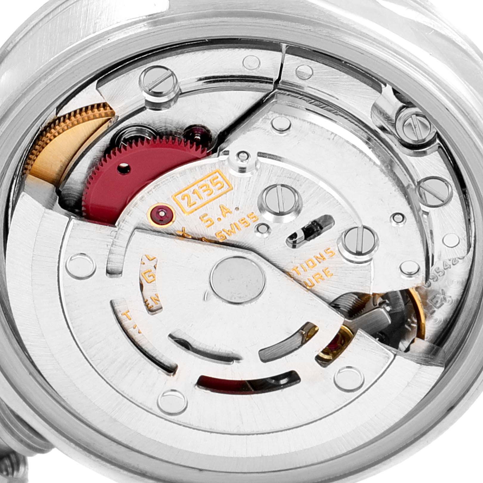 The image shows a close-up view of the Rolex Date 69190 Women's Stainless Steel Silver Dial 69190 Women's Stainless Steel Silver Dial model's movement, highlighting internal components.