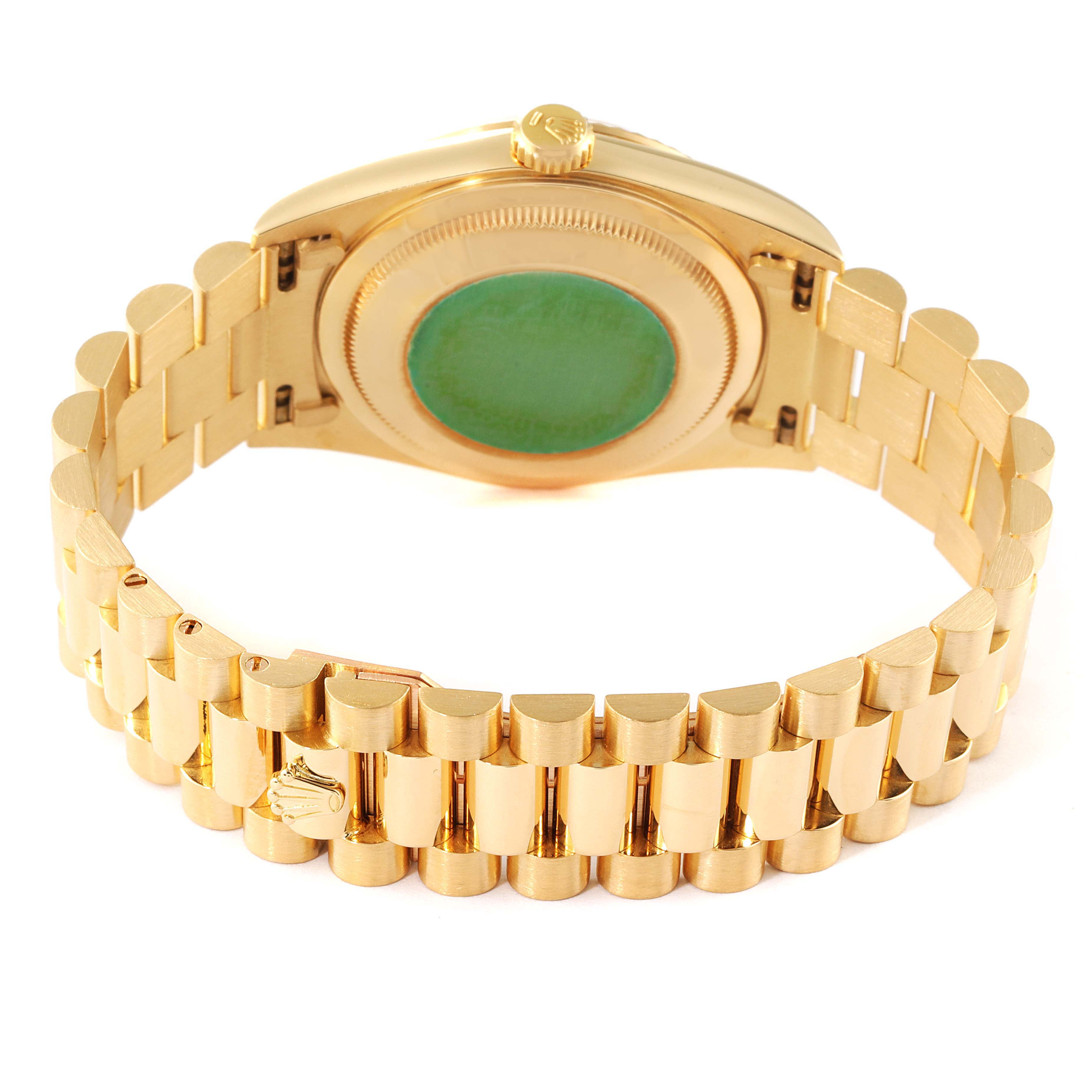 The image shows the back view of a Rolex President 16238 Men
s Yellow Gold Champagne Dial 16238 Men
s Yellow Gold Champagne Dial model watch, focusing on its gold bracelet and case back.