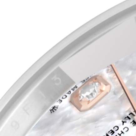 The image shows a close-up of the Rolex Datejust 279171NG Women's Steel and Gold (two tone) Mother of Pearl Dial 279171NG Women's Steel and Gold (two tone) Mother of Pearl Dial watch face, highlighting the diamond hour marker and part of the date window.