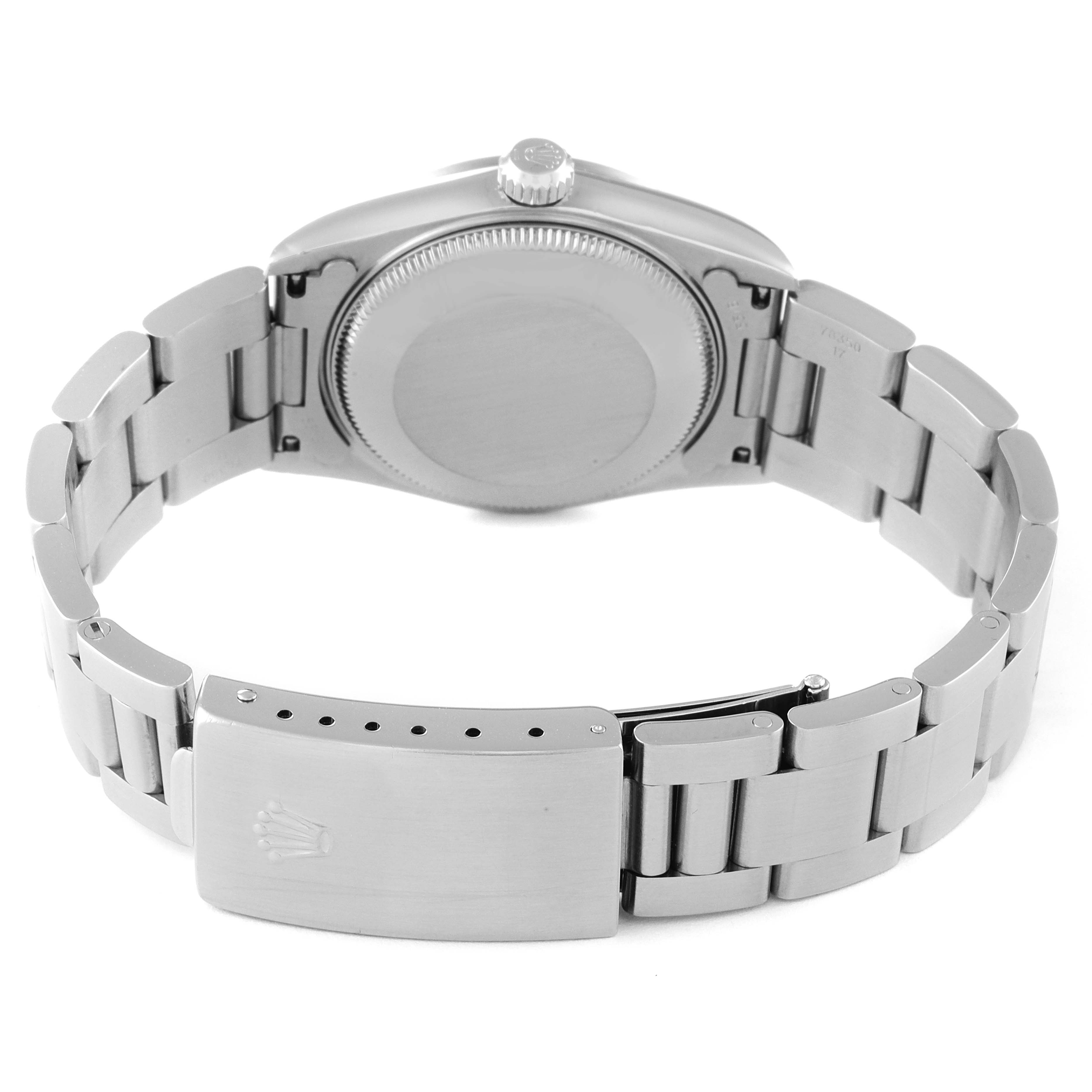 The image shows the back view of a Mid-Size Rolex watch, including the case back, crown, and bracelet with clasp.