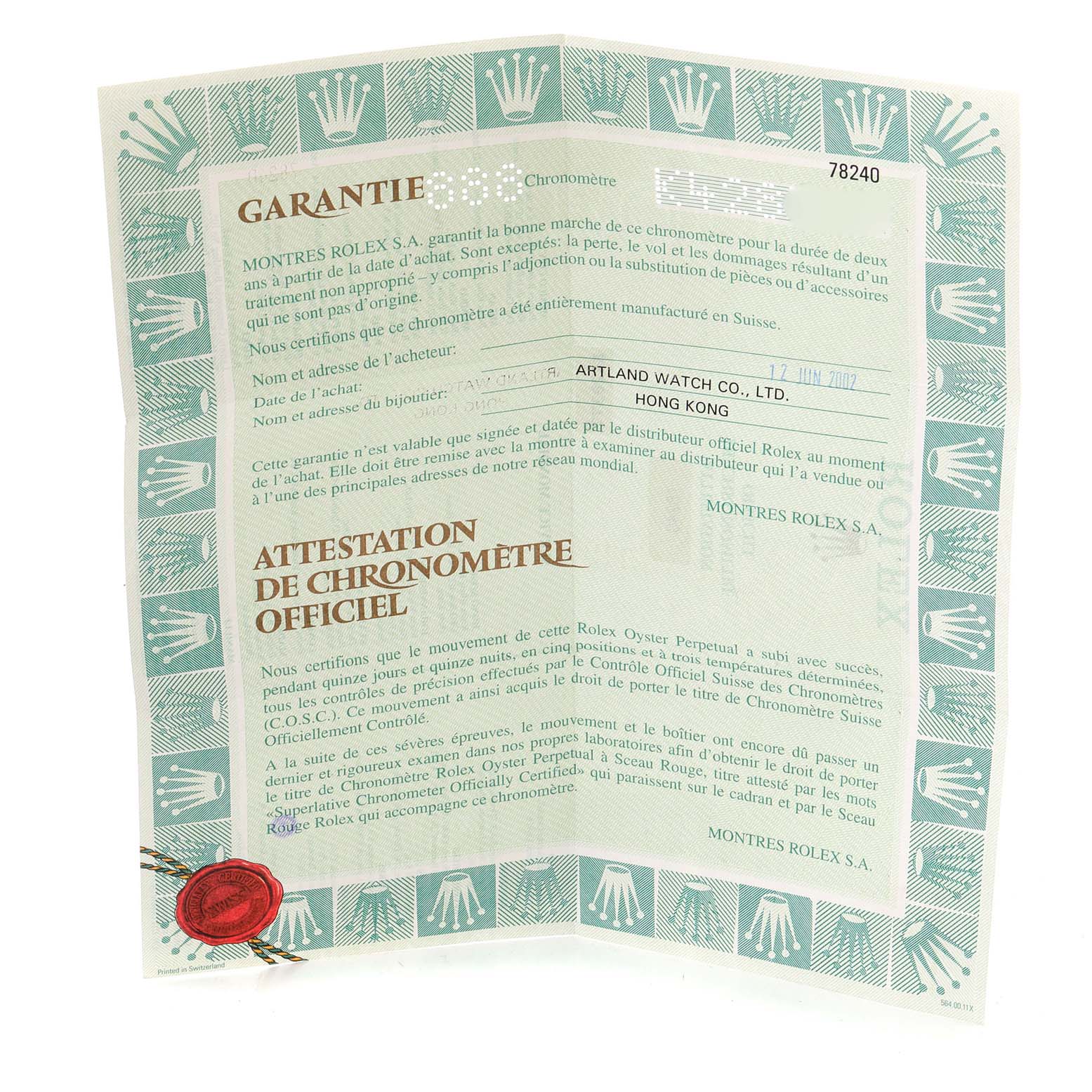 The image shows the warranty and chronometer certificate for a Mid-Size Rolex watch.