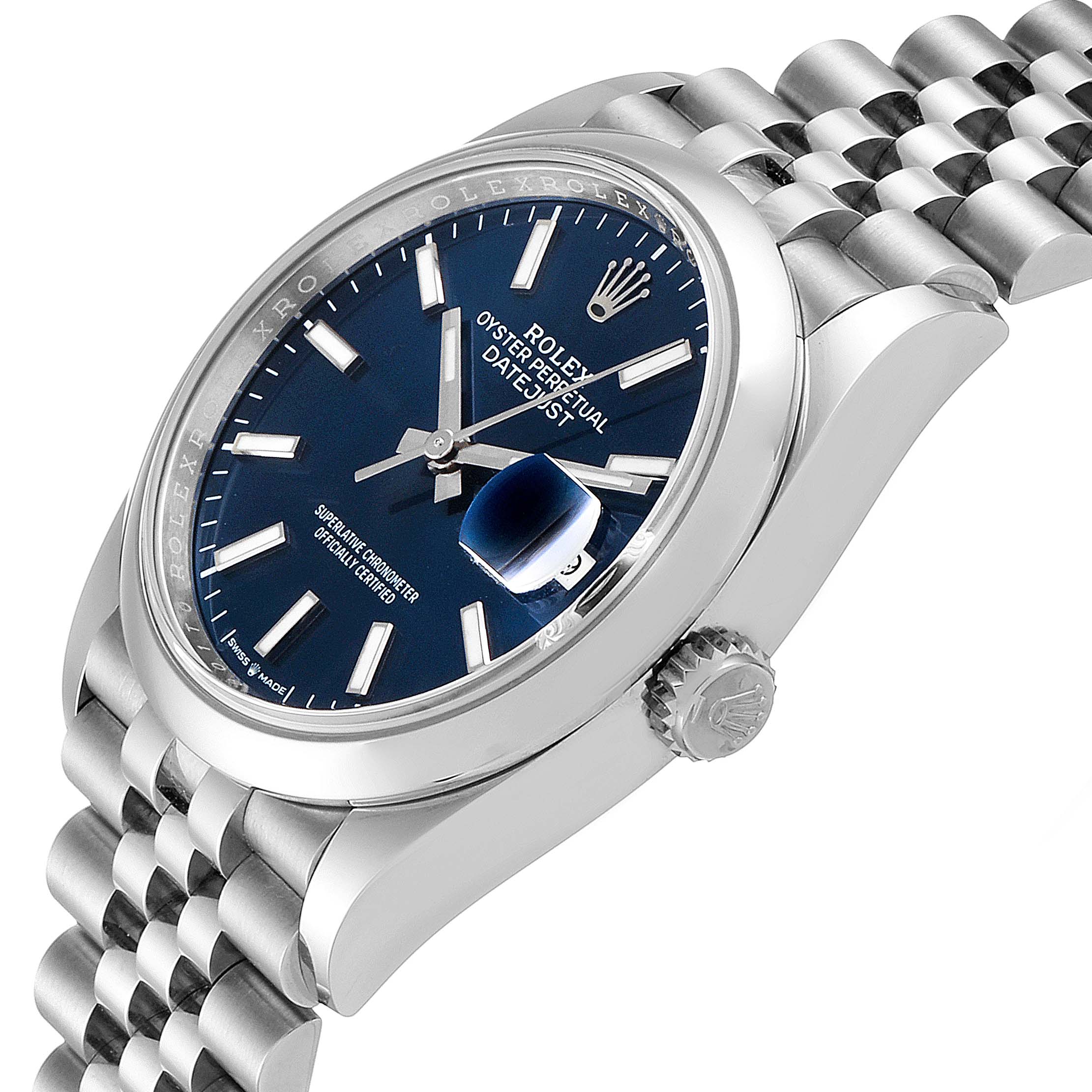 This image shows a Rolex Datejust 126200 Men's Stainless Steel Blue Dial 126200 Men's Stainless Steel Blue Dial watch at an angle, highlighting the blue dial, fluted bezel, crown, and Jubilee bracelet.