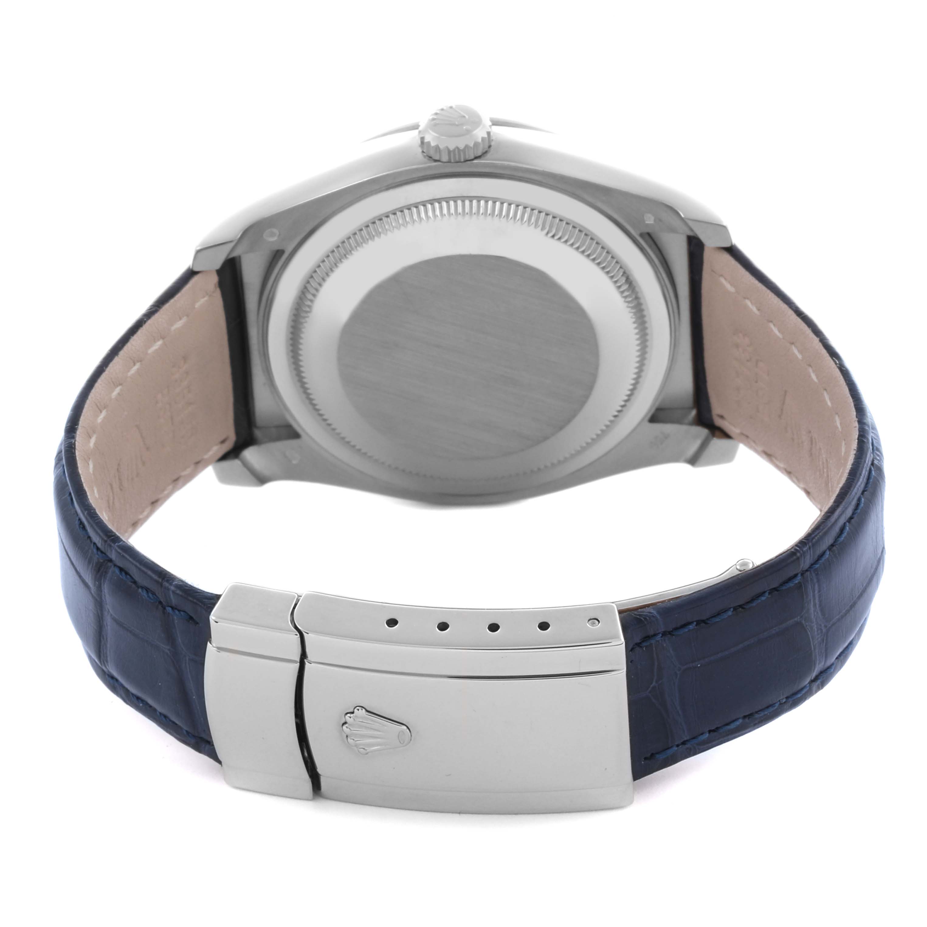 The image shows the back of a Rolex Datejust 116189 Men's White Gold Mother of Pearl Dial 116189 Men's White Gold Mother of Pearl Dial watch, highlighting the case, crown, and blue leather strap with clasp.