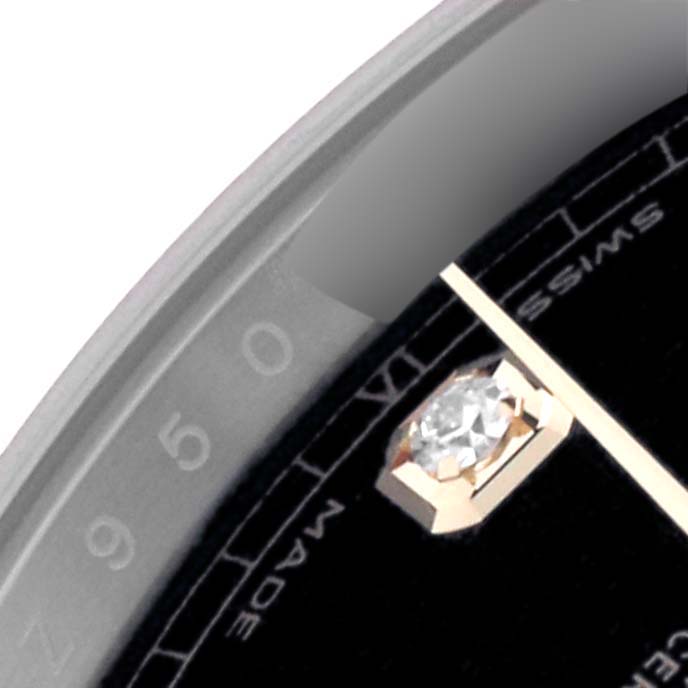 The image shows a close-up of the dial edge of a Rolex Datejust 41 126333 Men's Steel and Gold (two tone) Black Dial 126333 Men's Steel and Gold (two tone) Black Dial, featuring a diamond hour marker and part of a watch hand.