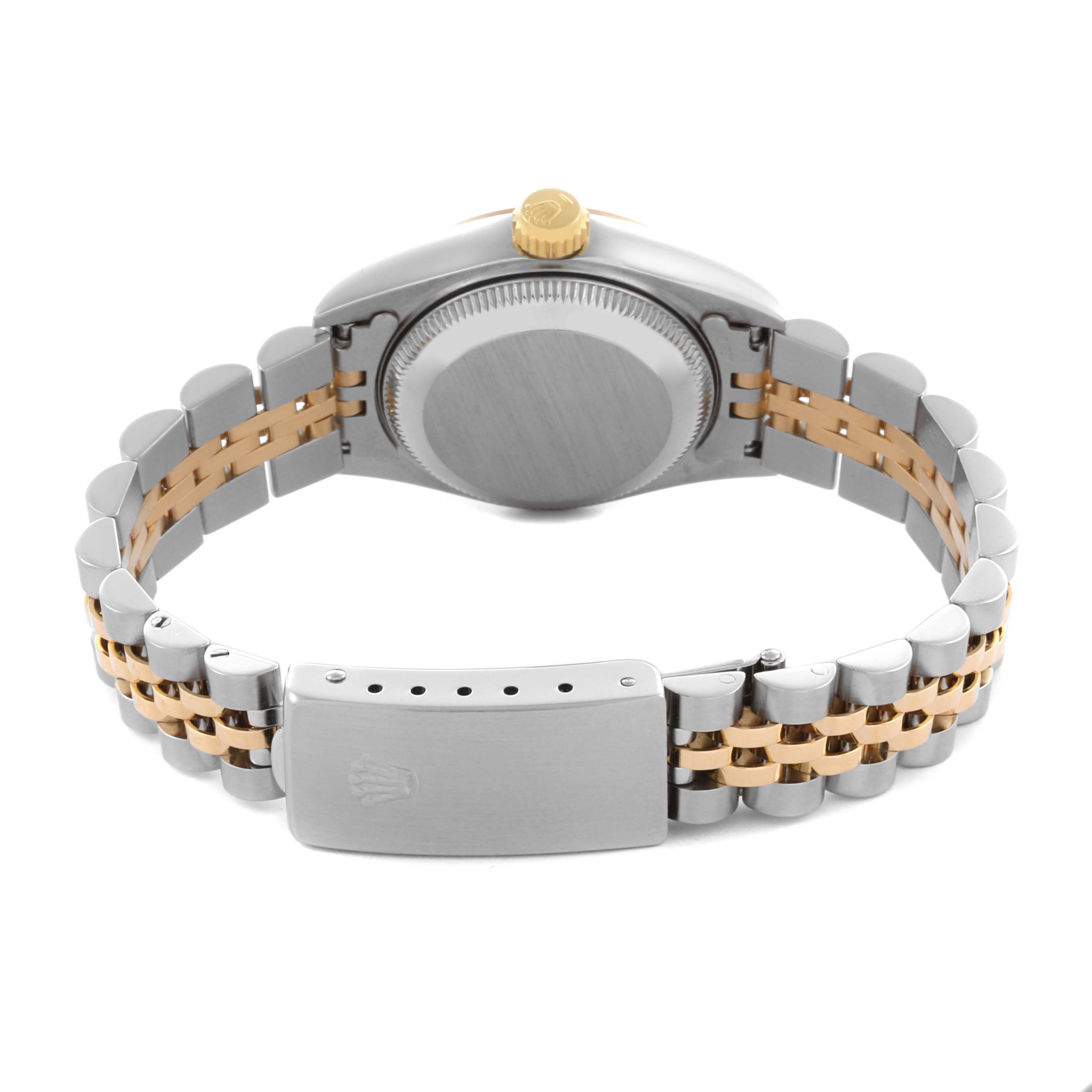 The Rolex Datejust 69173 Women's Steel and Gold (two tone) White Dial 69173 Women's Steel and Gold (two tone) White Dial watch is shown from the back, featuring the case back, crown, and two-tone Jubilee bracelet with a clasp.