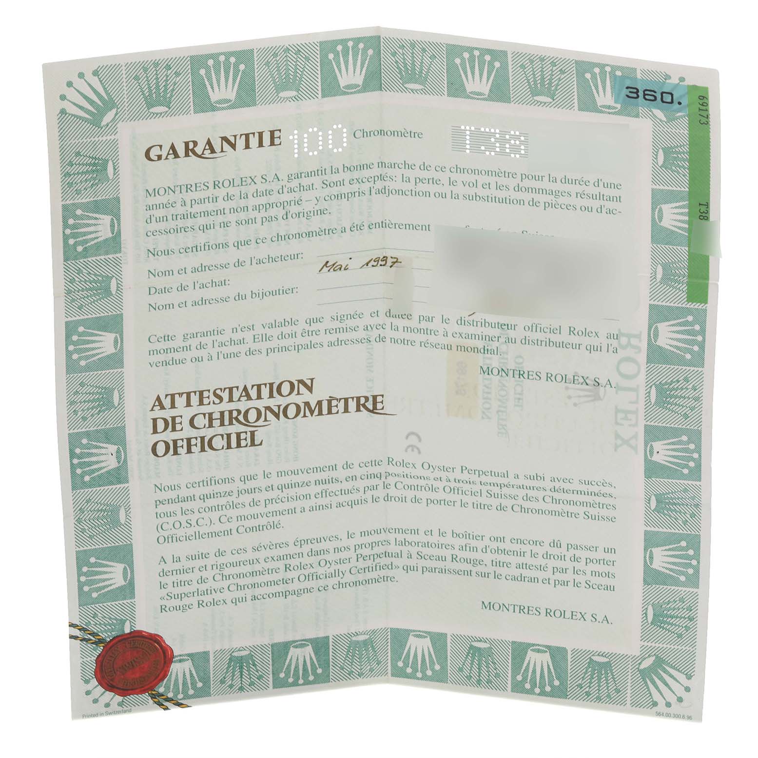 The image shows a warranty card for a Rolex Datejust 69173 Women's Steel and Gold (two tone) White Dial 69173 Women's Steel and Gold (two tone) White Dial, viewed partially unfolded with text and emblems visible.