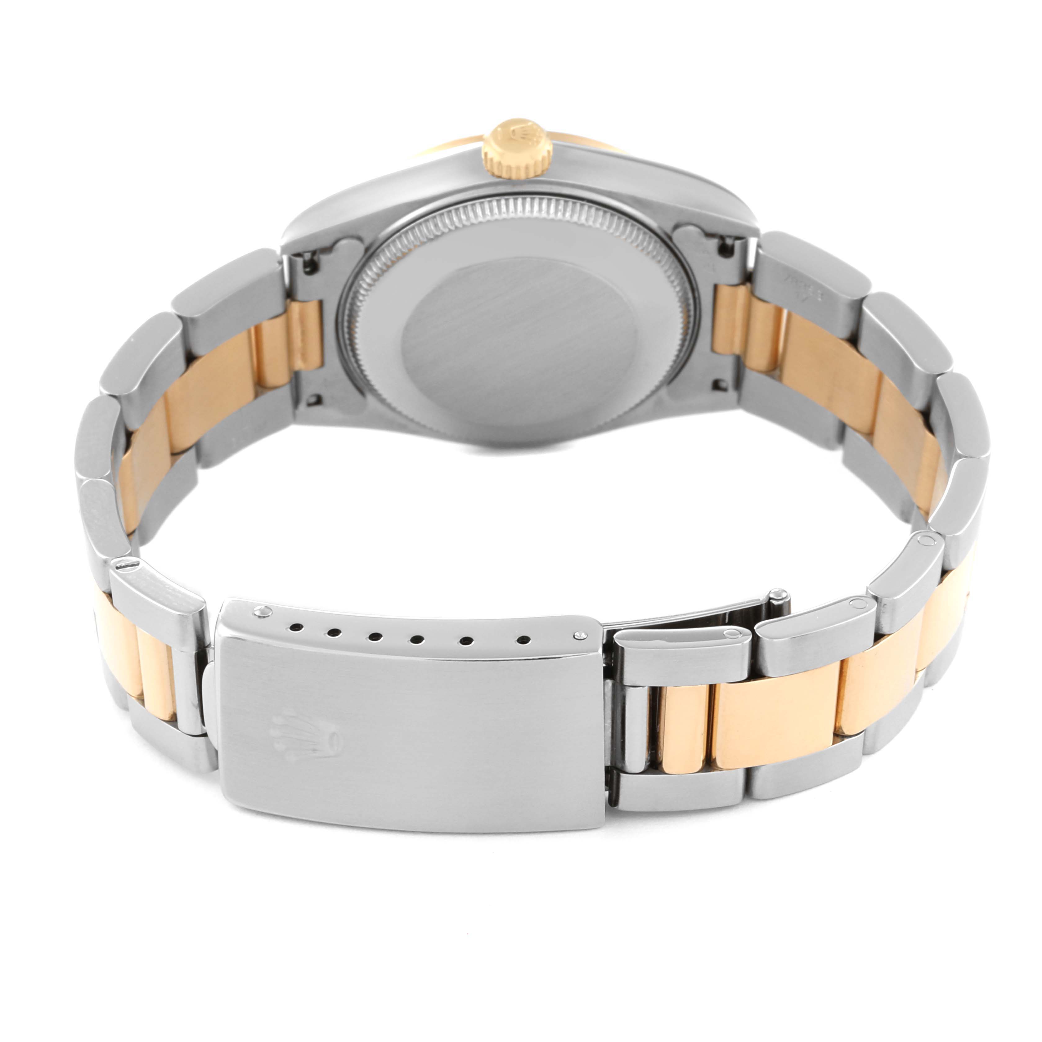 This image shows the back view of a Rolex Mid-Size 68243 Women
s Steel and Gold (two tone) White Dial 68243 Women
s Steel and Gold (two tone) White Dial watch, focusing on the case back, crown, and bracelet clasp.