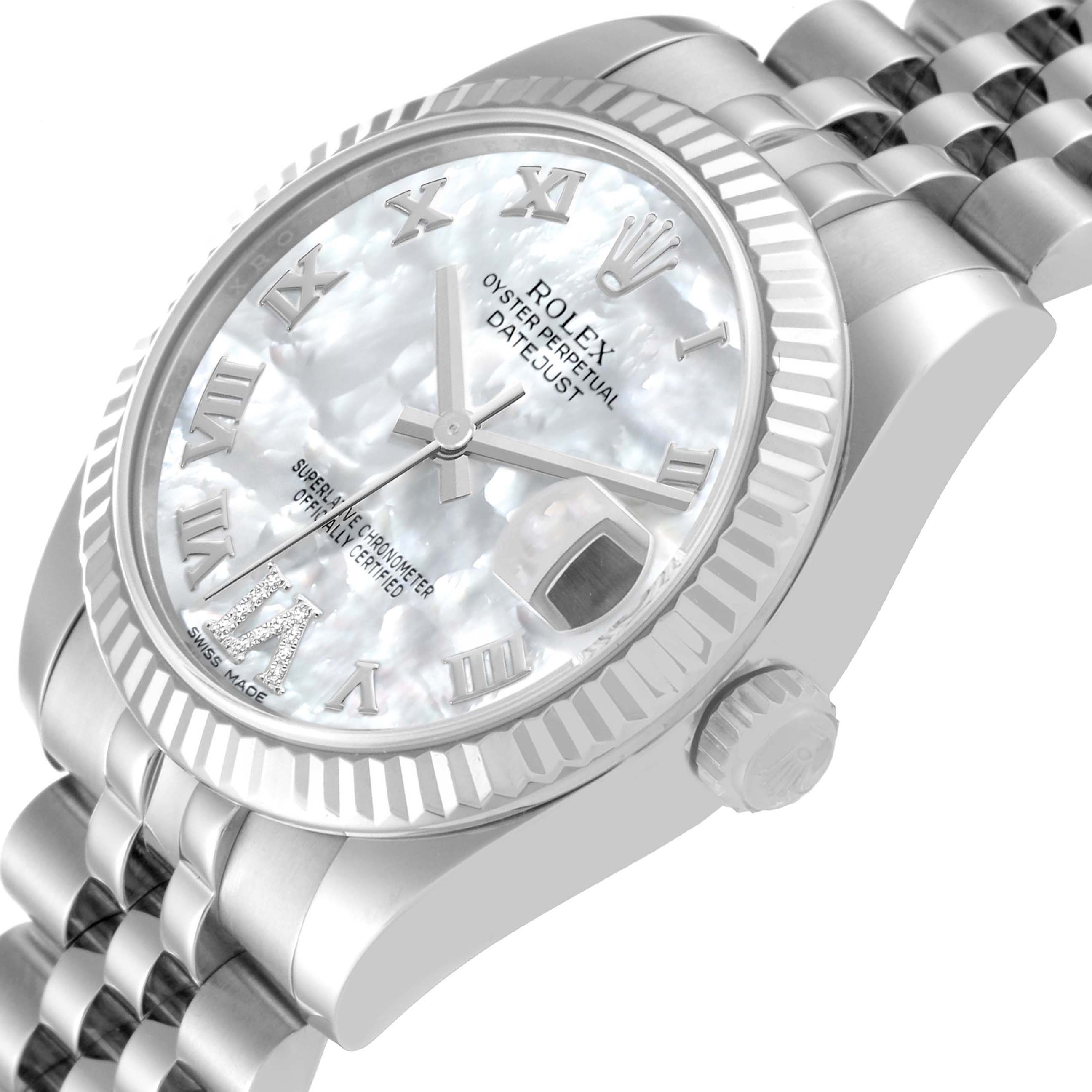 This Rolex Mid-Size 178274 Women
s Stainless Steel Mother of Pearl Dial 178274 Women
s Stainless Steel Mother of Pearl Dial Datejust watch is shown from an angled close-up, highlighting its bezel, dial, hands, and crown.