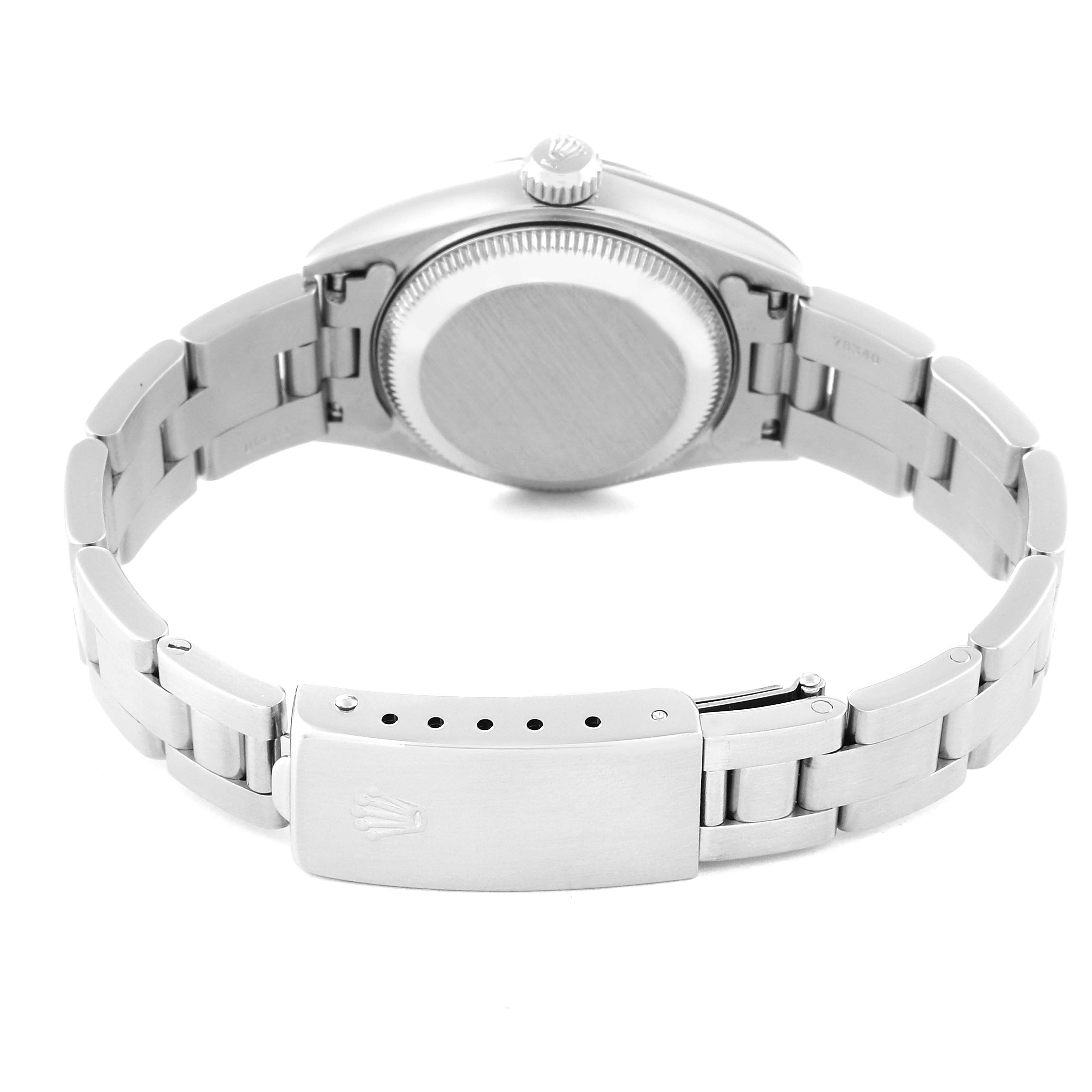 The image shows the back side of a Rolex Datejust 69174 Women's Stainless Steel White Dial 69174 Women's Stainless Steel White Dial watch featuring its clasp, bracelet, and case back.