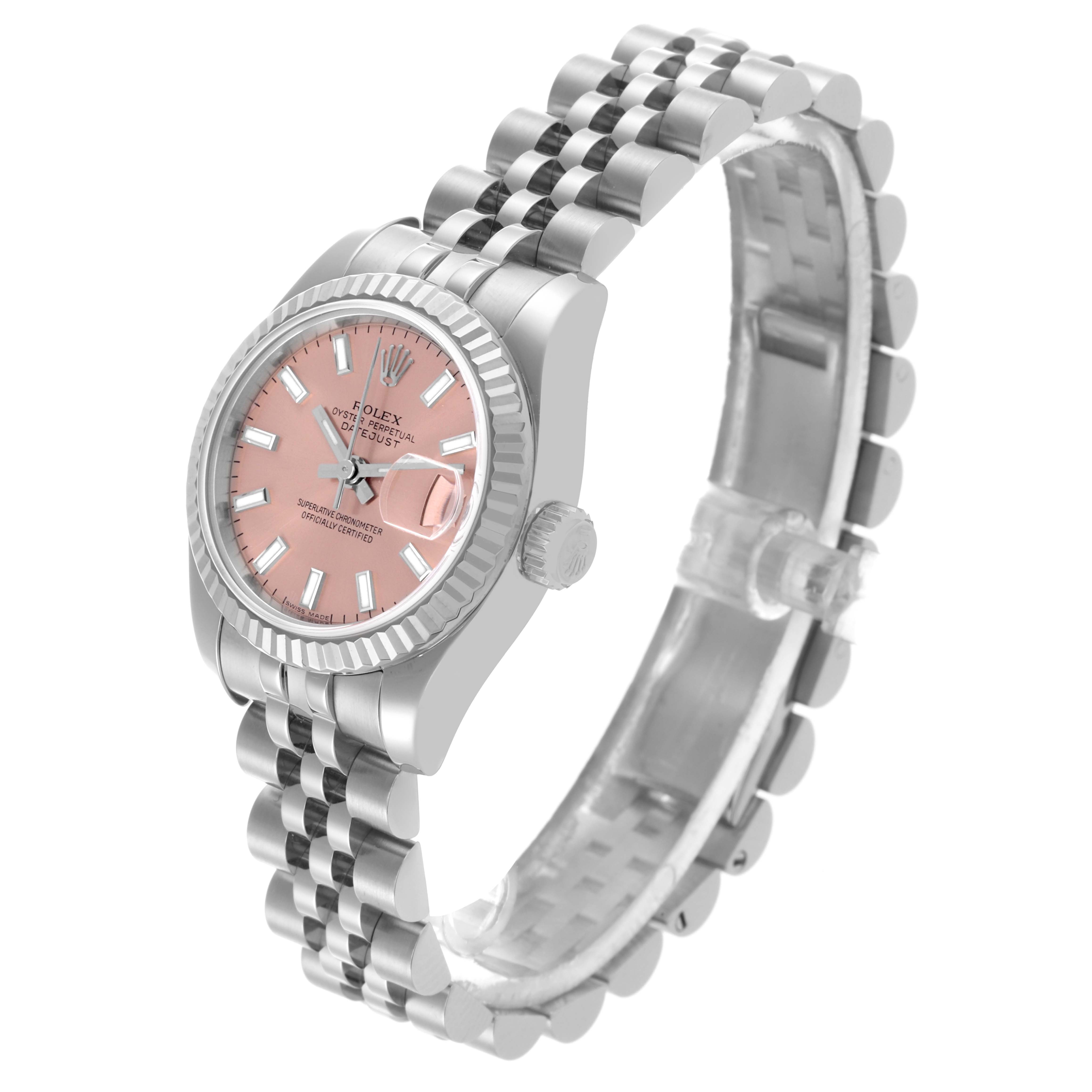 The Rolex Datejust 179174 Women's Stainless Steel Pink Dial 179174 Women's Stainless Steel Pink Dial watch is shown at a three-quarter angle, highlighting the face, bezel, crown, and bracelet.