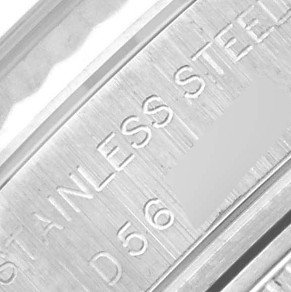 The image shows a close-up of the engraving inside the stainless steel bezel of a Rolex Datejust 179174 Women's Stainless Steel Pink Dial 179174 Women's Stainless Steel Pink Dial watch.