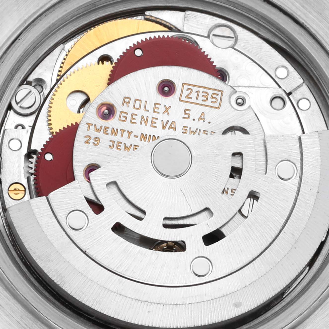 The image shows the movement of a Rolex Datejust 69173 Women's Steel and Gold (two tone) Champagne Dial 69173 Women's Steel and Gold (two tone) Champagne Dial watch, highlighting gears and the rotor from a close-up, angled view.