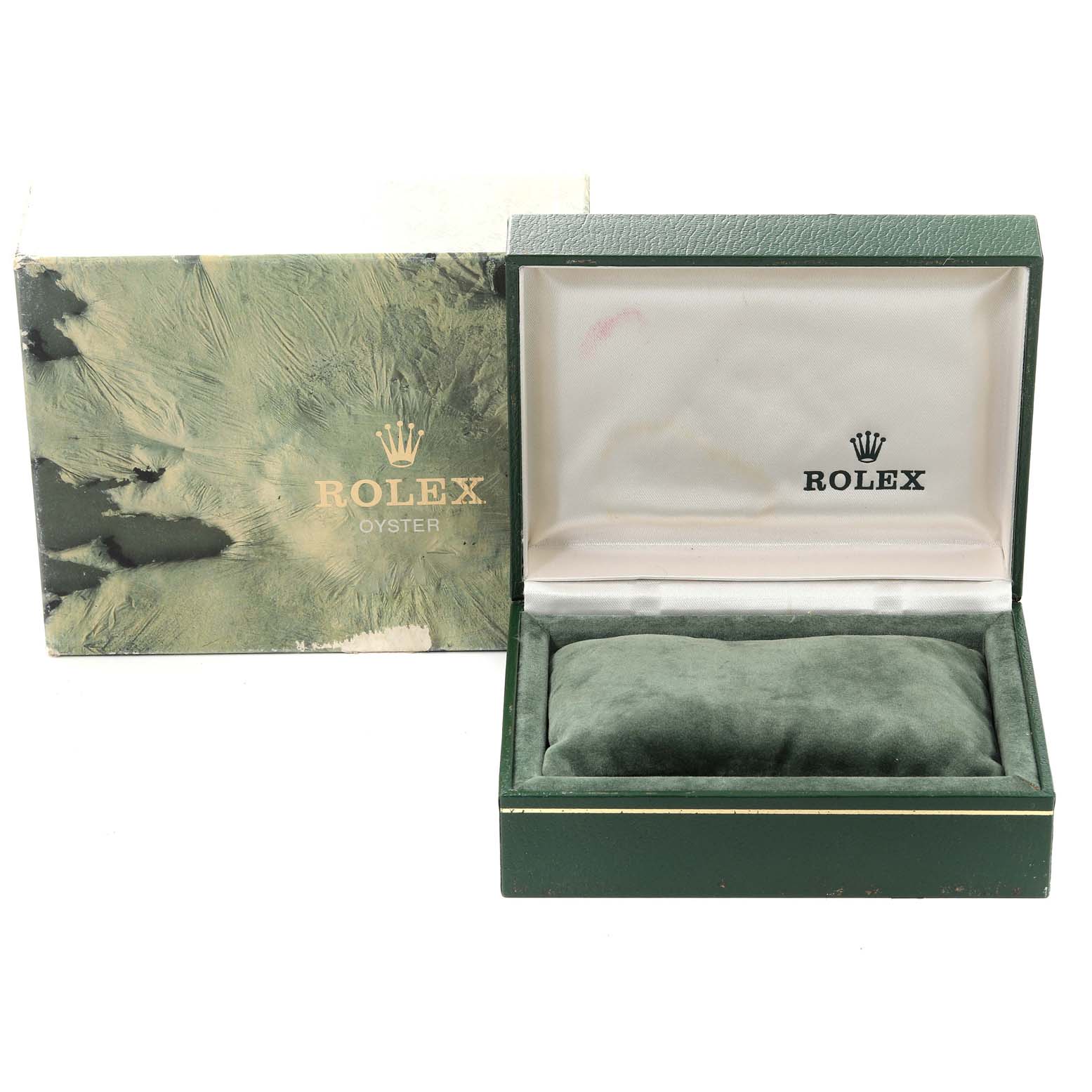 The image shows an open Rolex Datejust 16013 Men's Steel and Gold (two tone) Champagne Dial 16013 Men's Steel and Gold (two tone) Champagne Dial watch box with a green exterior and a cushion inside, alongside its outer packaging.