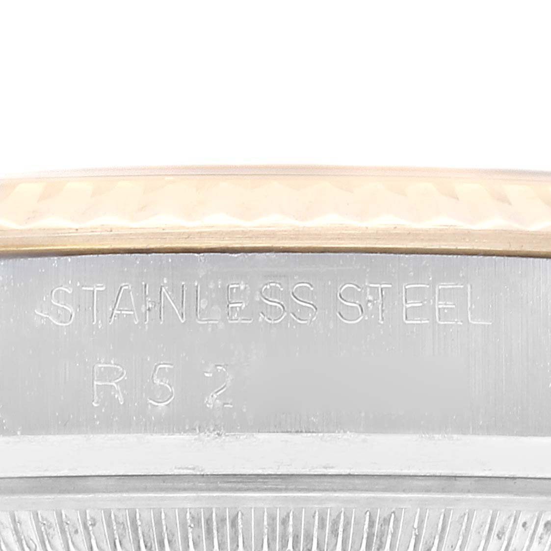 The image shows a close-up side view of the stainless steel case and bezel of a Rolex Datejust 16013 Men's Steel and Gold (two tone) Champagne Dial 16013 Men's Steel and Gold (two tone) Champagne Dial model.