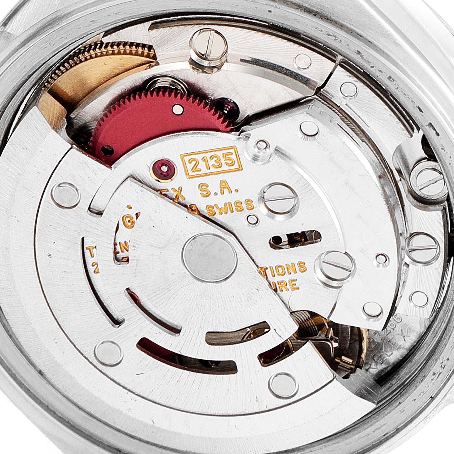 This image shows a close-up view of the internal mechanical movement of a Rolex Datejust 69173 Women
s Steel and Gold (two tone) Champagne Dial 69173 Women
s Steel and Gold (two tone) Champagne Dial watch, revealing gears and components.