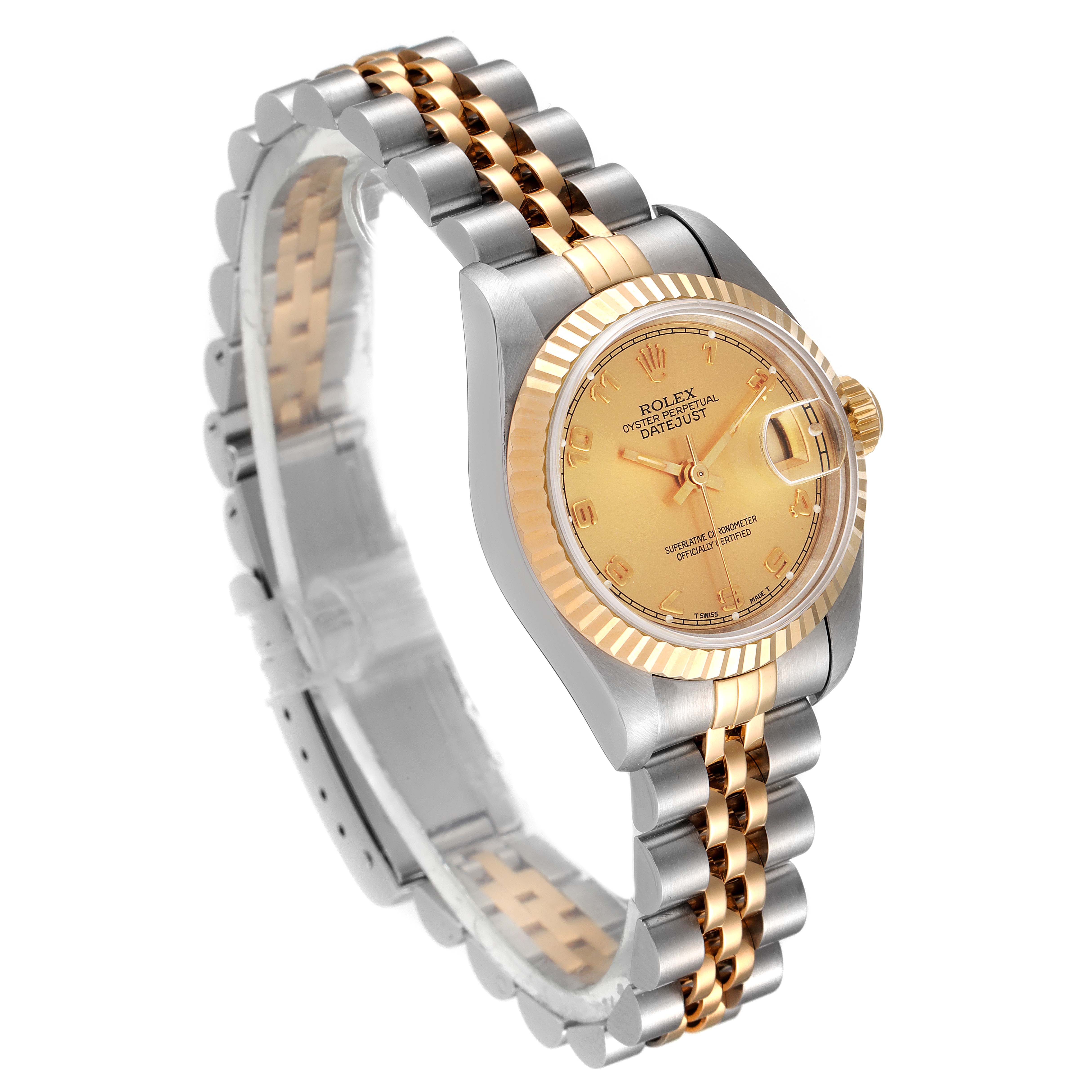 The image shows a side angle of a Rolex Datejust 69173 Women
s Steel and Gold (two tone) Champagne Dial 69173 Women
s Steel and Gold (two tone) Champagne Dial watch, highlighting its gold and silver bracelet, bezel, and dial.