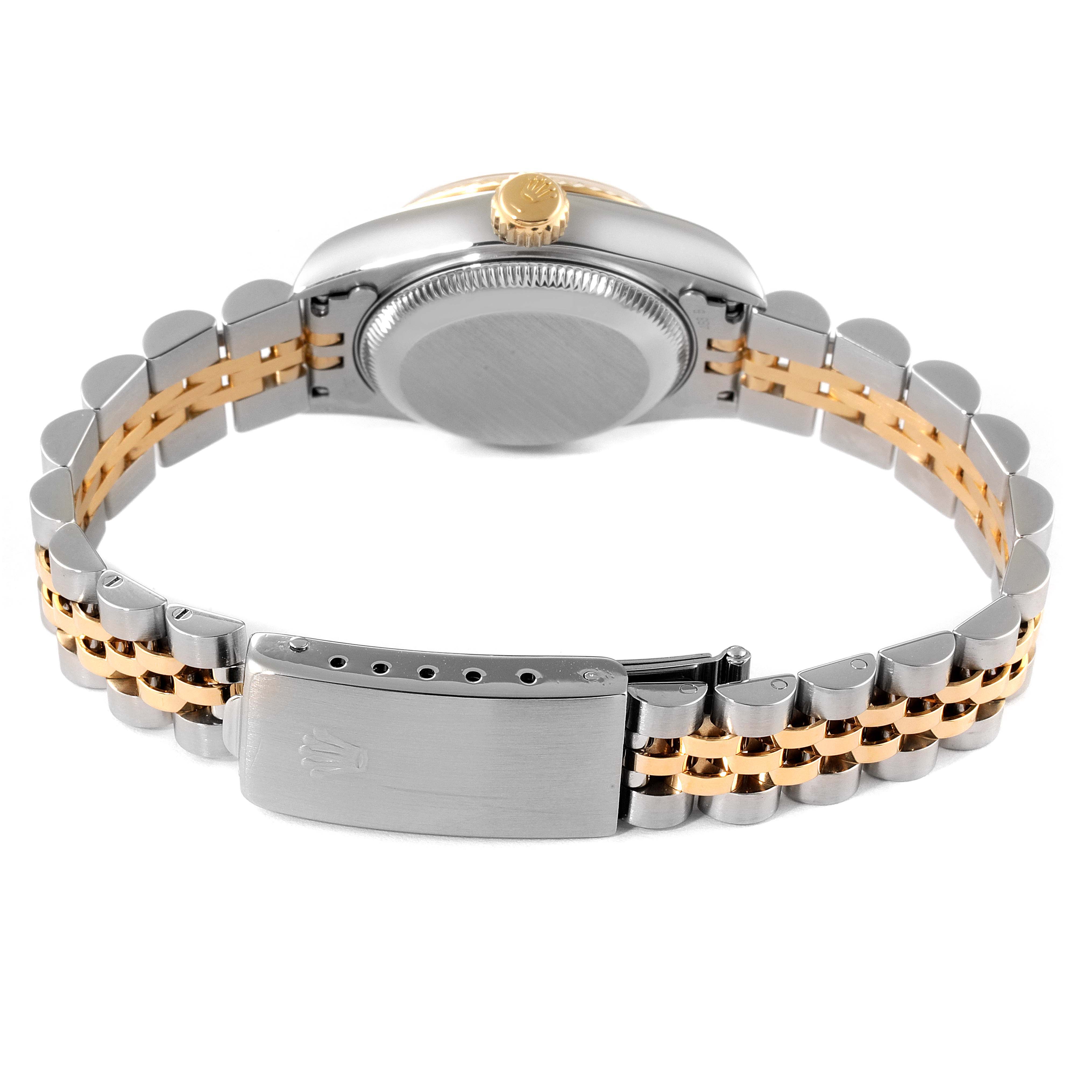 The image shows the back view of a Rolex Datejust 69173 Women
s Steel and Gold (two tone) Champagne Dial 69173 Women
s Steel and Gold (two tone) Champagne Dial, highlighting the case back, crown, and two-tone Jubilee bracelet.