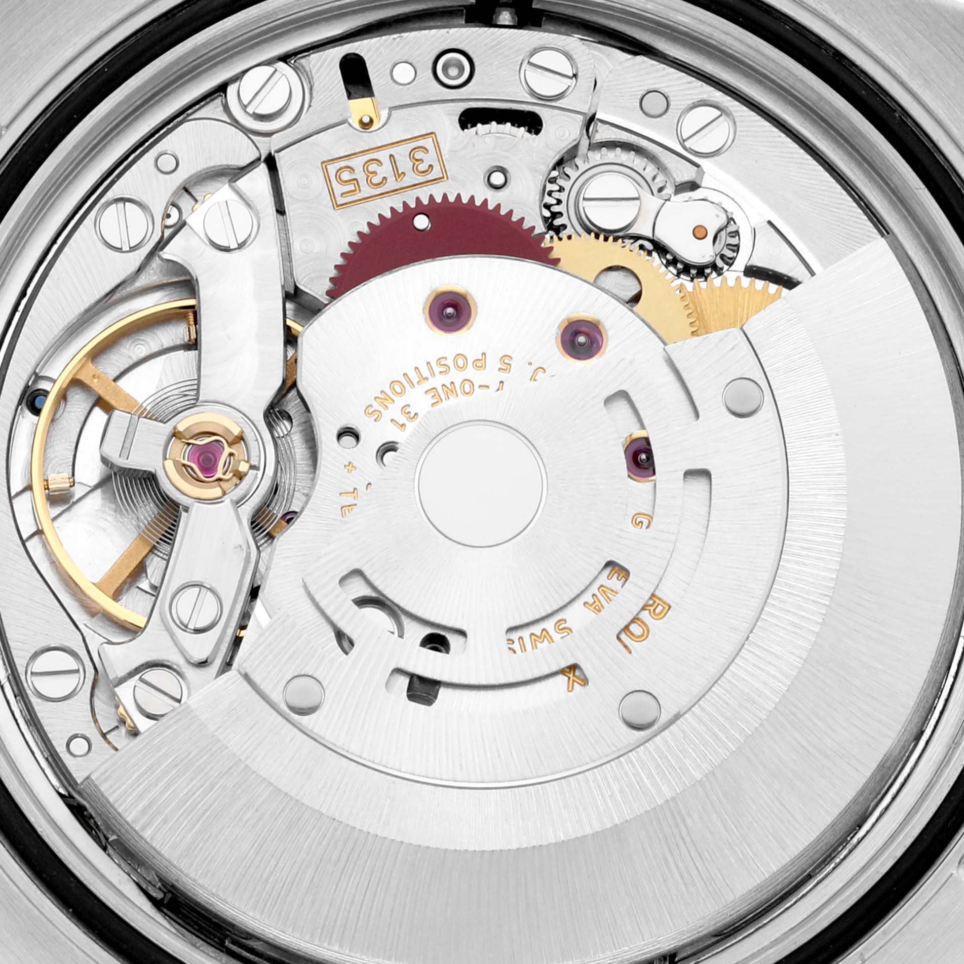 This is a close-up image of the movement mechanism of a Rolex Datejust 116233 Men's Steel and Gold (two tone) Silver Dial 116233 Men's Steel and Gold (two tone) Silver Dial watch, showing gears and internal components.