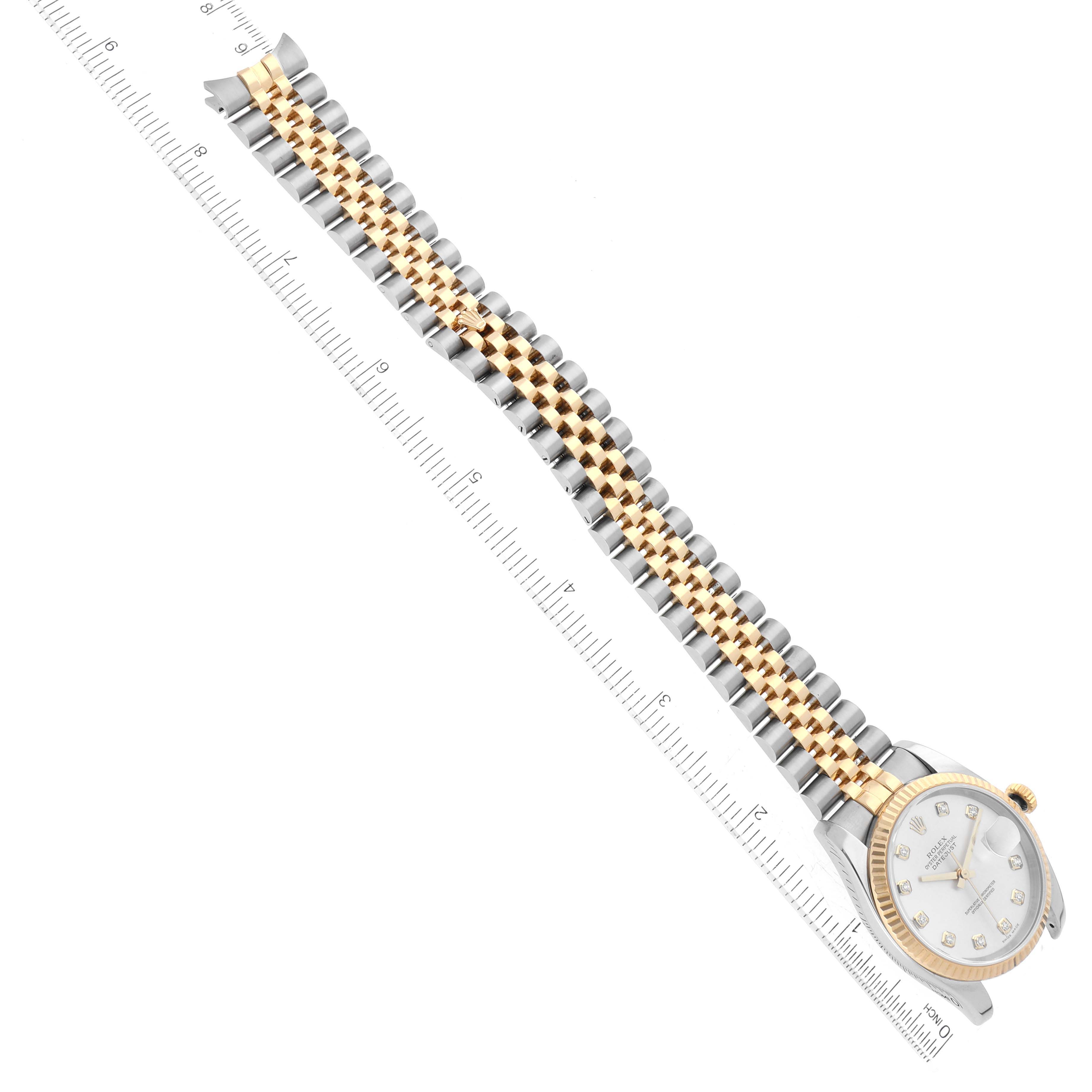 The image shows a Rolex Datejust 116233 Men's Steel and Gold (two tone) Silver Dial 116233 Men's Steel and Gold (two tone) Silver Dial watch laying flat with the watch face and entire bracelet visible, alongside a ruler for measurement.
