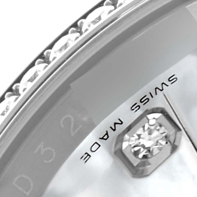 The image shows a close-up of a Rolex Datejust 116189 Men's White Gold Mother of Pearl Dial, featuring the bezel edge, diamond marker, and "SWISS MADE" text.