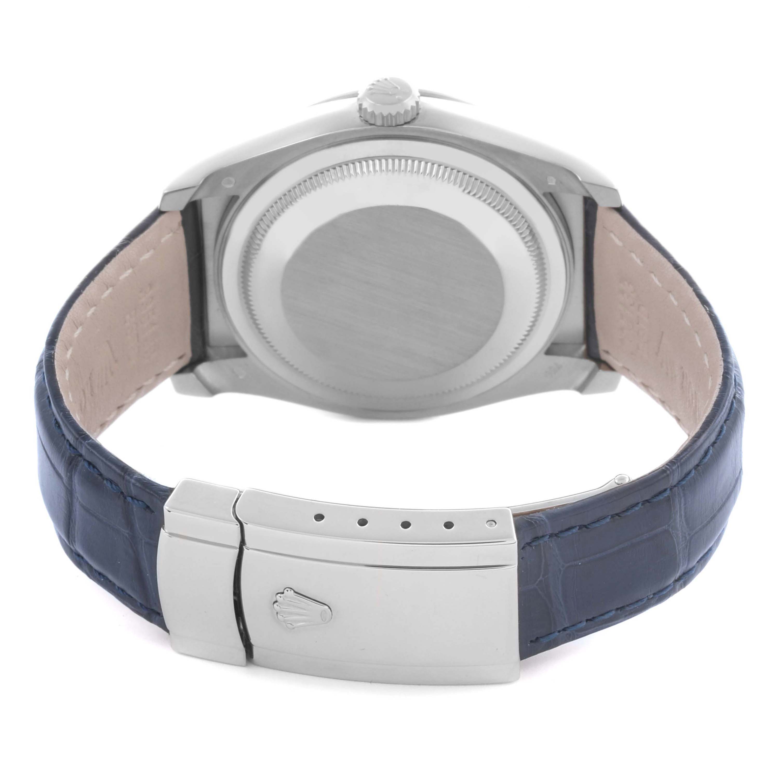 The Rolex Datejust 116189 Men's White Gold Mother of Pearl Dial watch is shown from the back, highlighting the case back, crown, and leather strap with clasp.