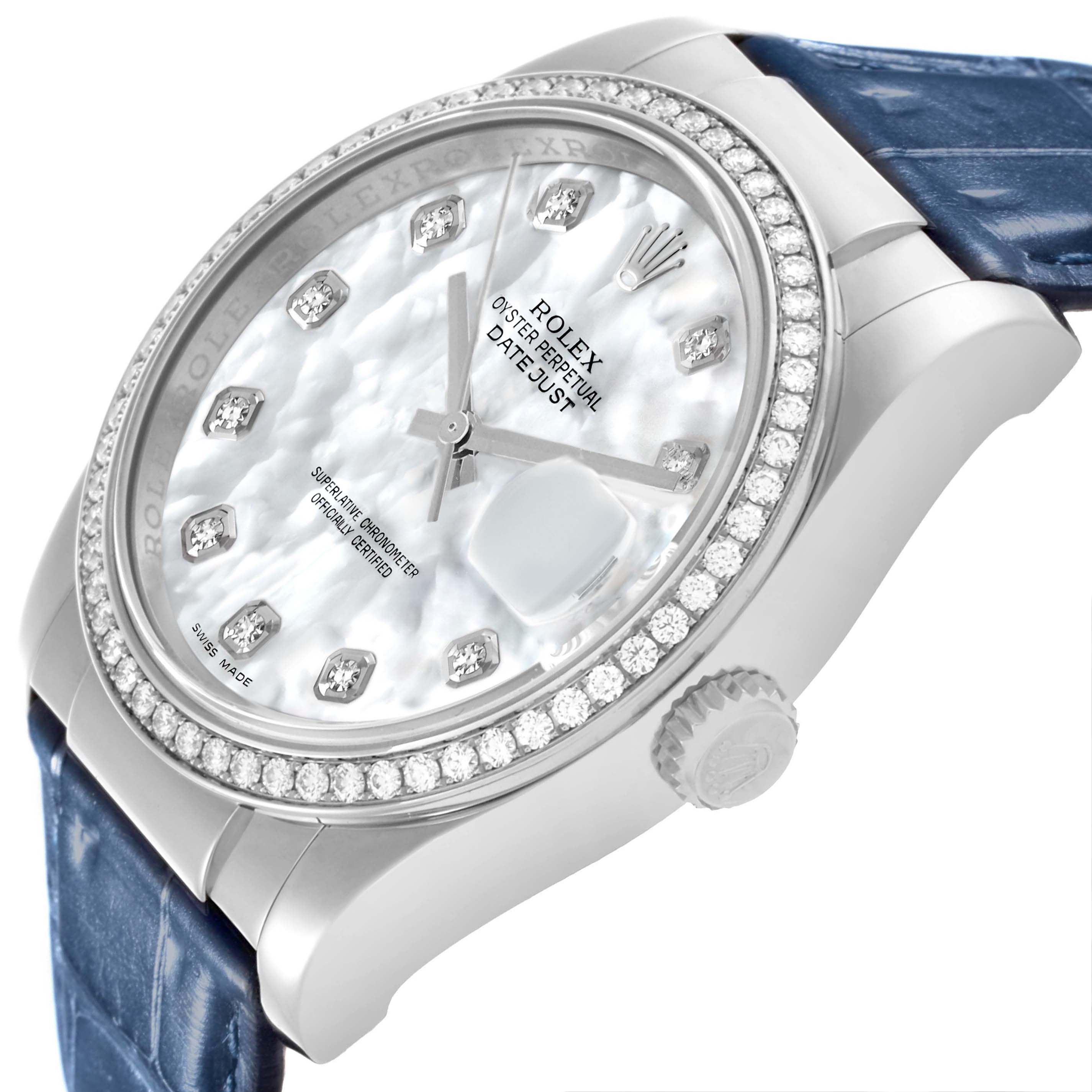 The Rolex Datejust 116189 Men's White Gold Mother of Pearl Dial watch is shown from a side angle, highlighting the dial, bezel with diamonds, crown, and a blue strap.
