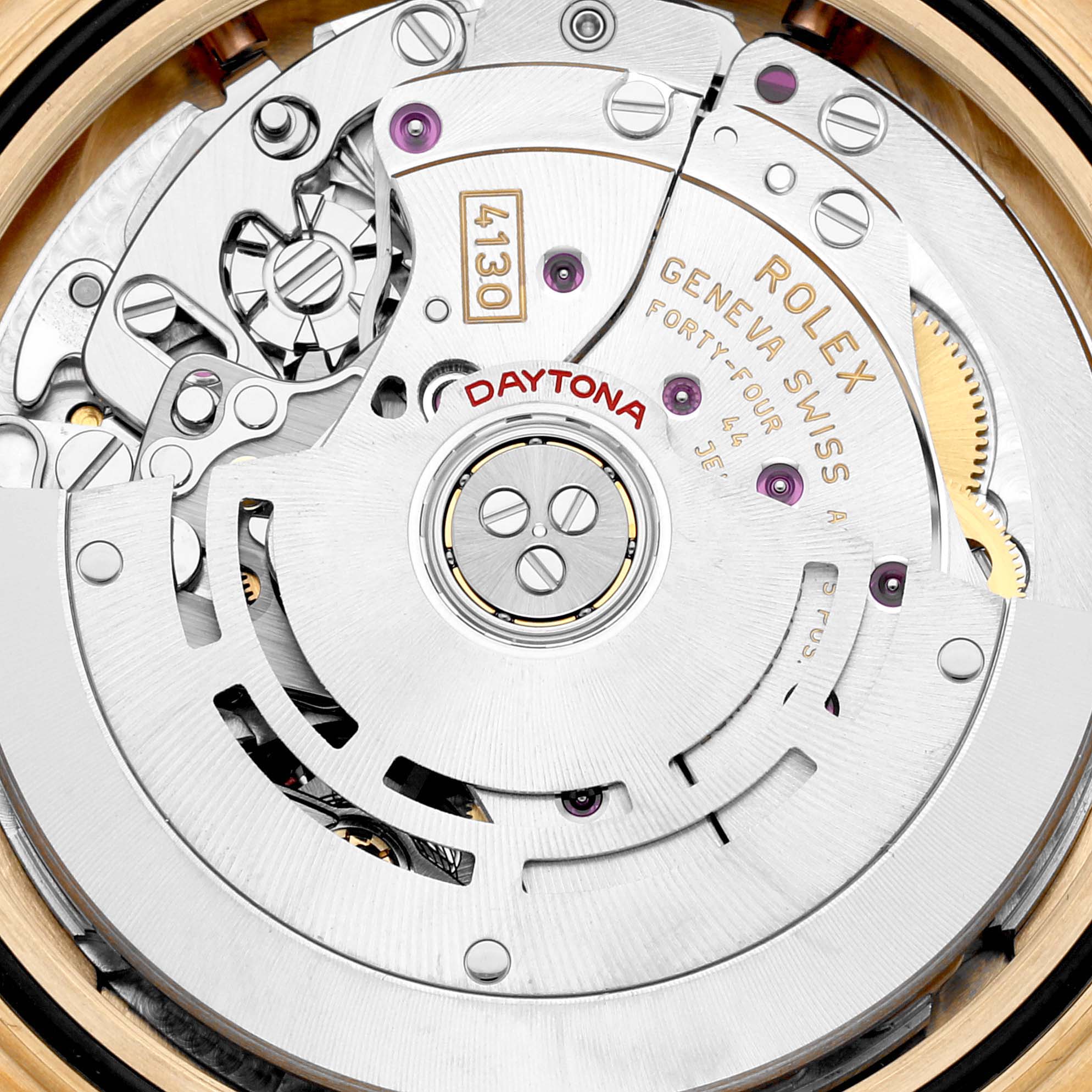 The image shows the intricate movement and internal components of a Rolex Daytona 116518 Men's Yellow Gold Mother of Pearl Dial 116518 Men's Yellow Gold Mother of Pearl Dial watch from a top-down angle.
