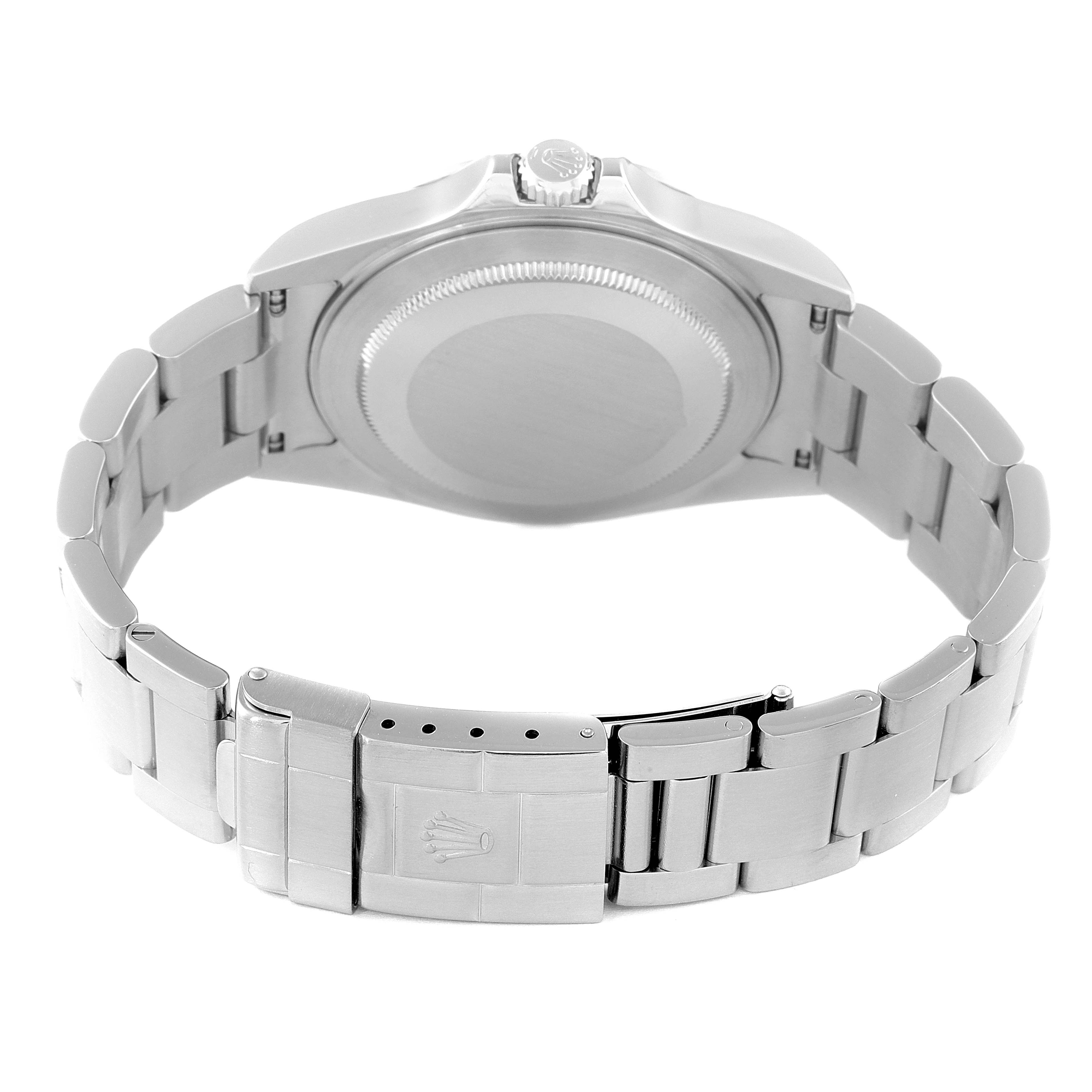 The image shows the back view of the Rolex Explorer 16570 Men's Stainless Steel White Dial 16570 Men's Stainless Steel White Dial watch, focusing on the case back and the clasp of the metal bracelet.