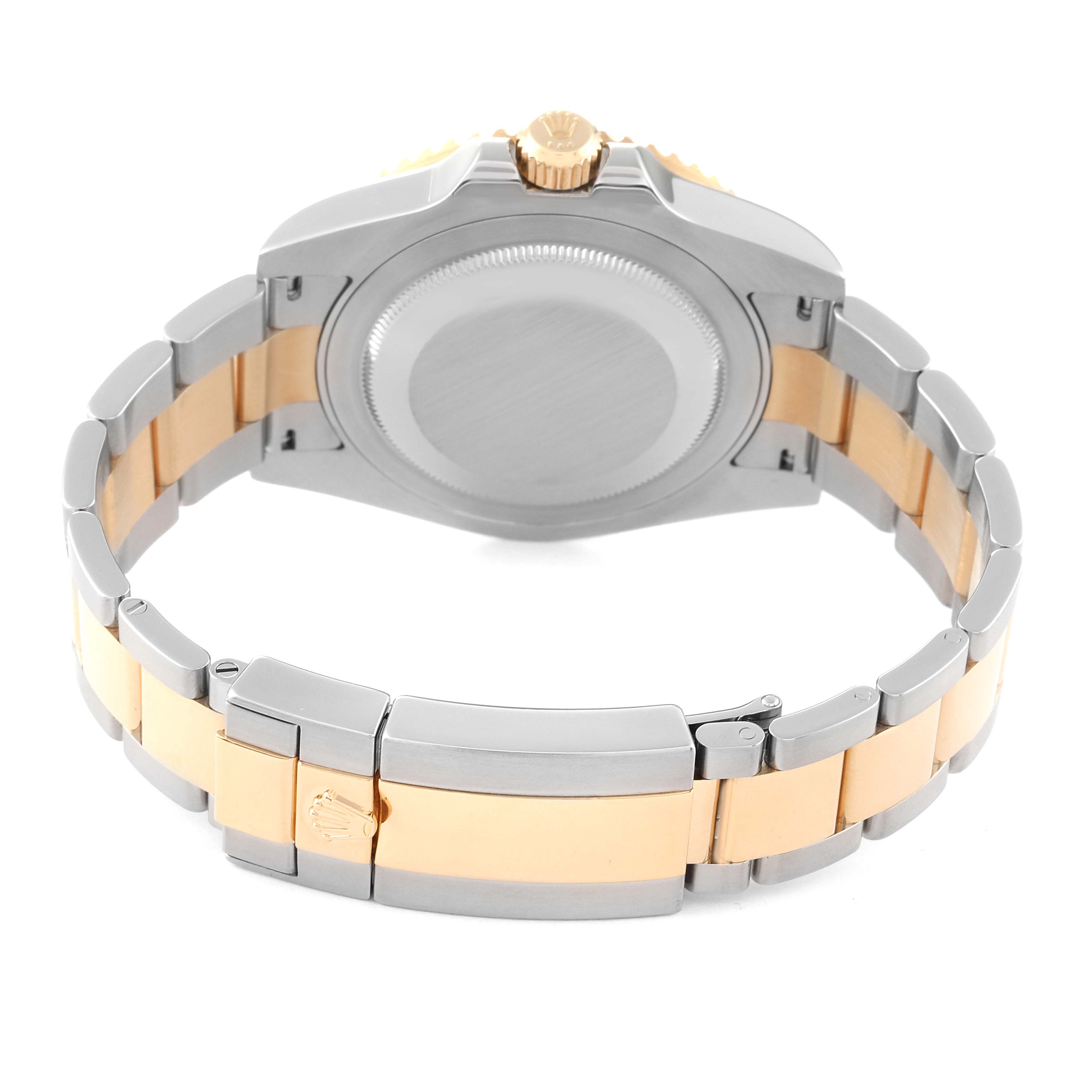 The image shows the back side of the Rolex GMT-Master 116713 Men's Steel and Gold (two tone) Black Dial 116713 Men's Steel and Gold (two tone) Black Dial watch, highlighting its case back and two-tone bracelet.