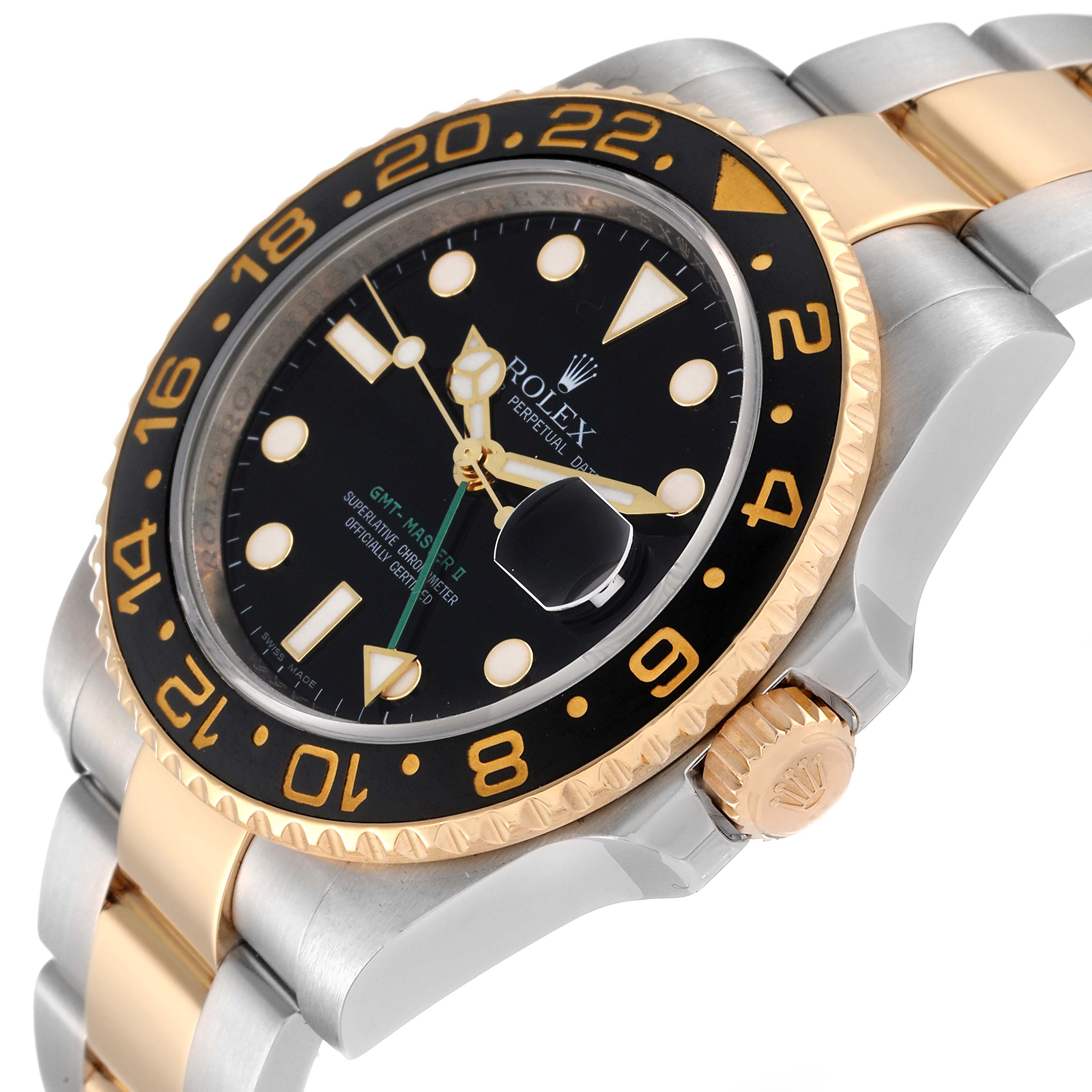 This image shows a close-up angle of the dial, bezel, crown, and partially the bracelet of a Rolex GMT-Master 116713 Men's Steel and Gold (two tone) Black Dial 116713 Men's Steel and Gold (two tone) Black Dial watch.